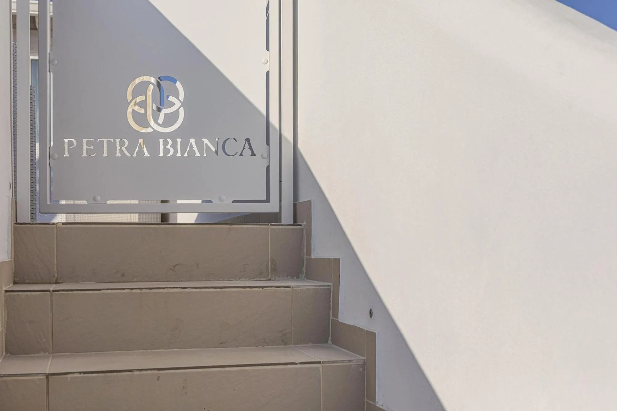 Property logo or sign in Petra Bianca