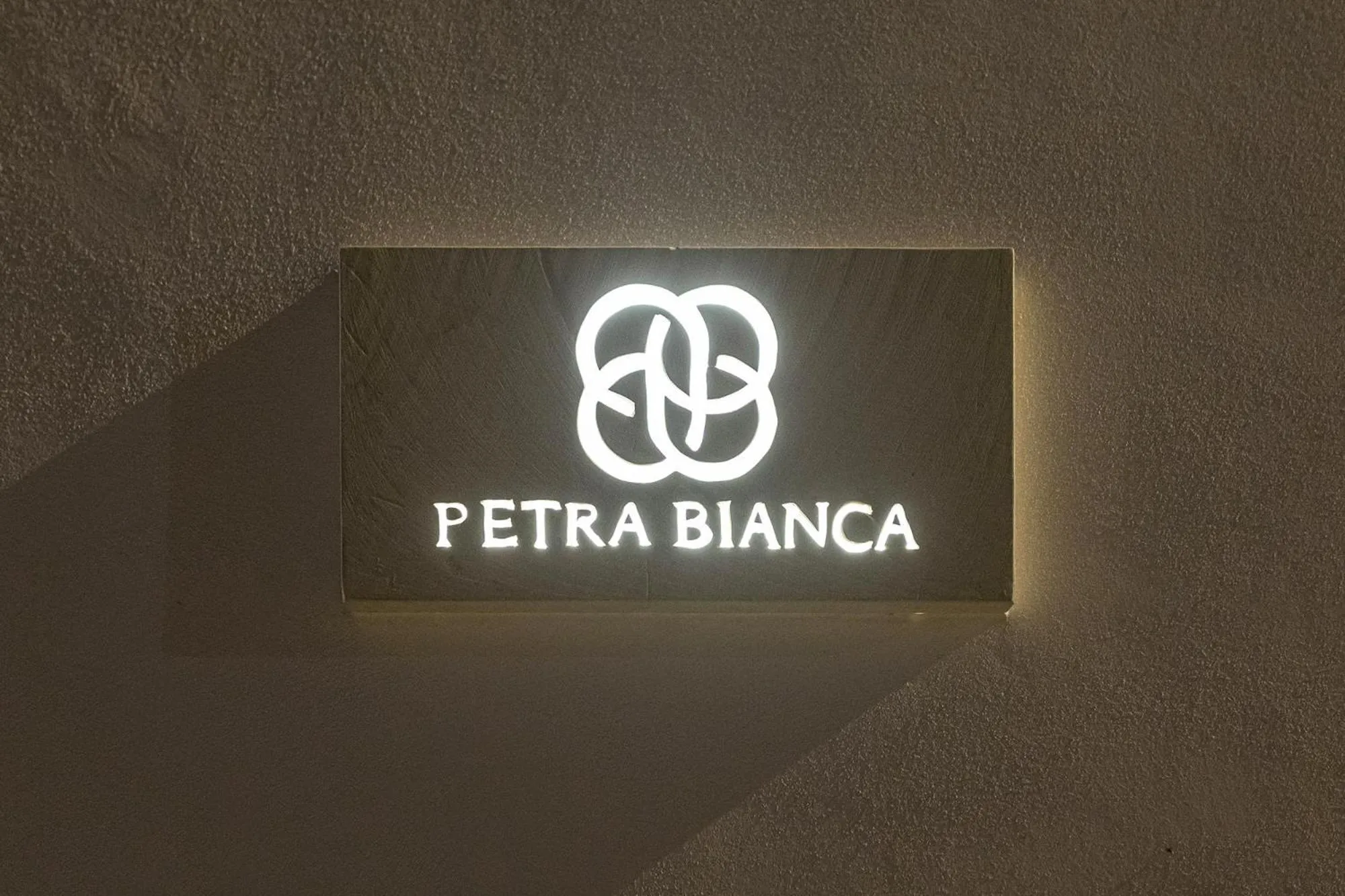 Property logo or sign in Petra Bianca