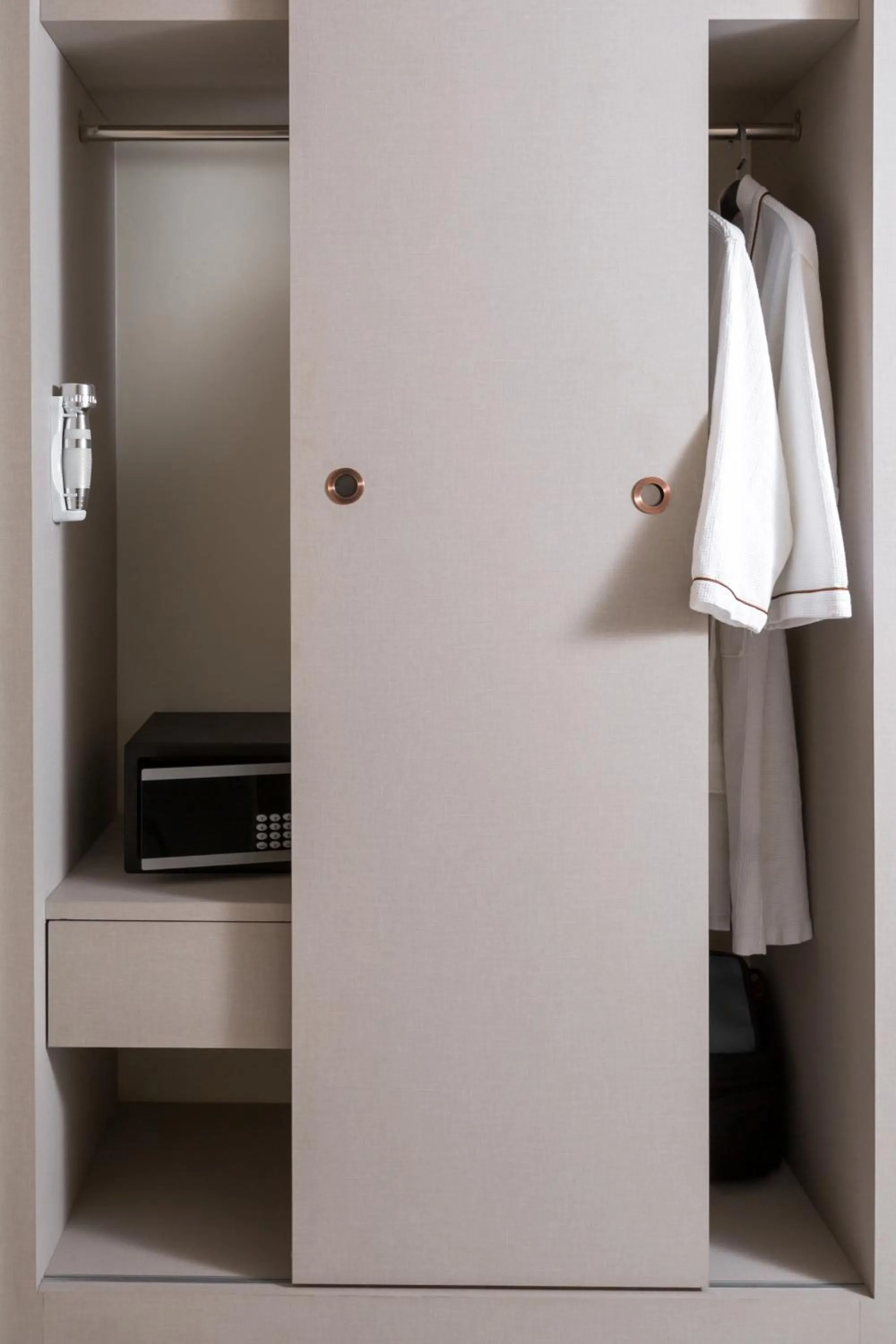 wardrobe in The 8 Hotel Udonthani