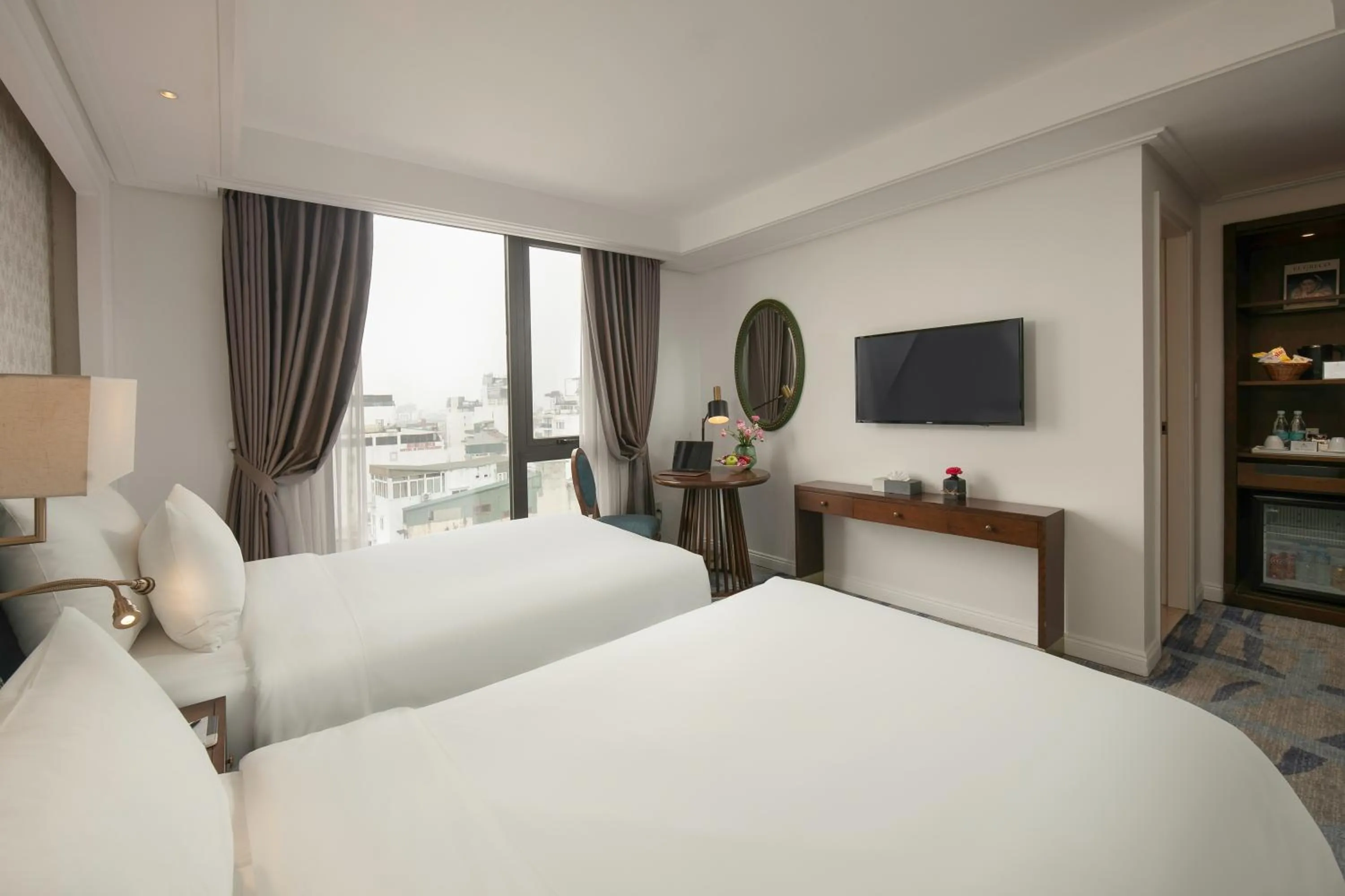 Bed in The Oriental Jade Hotel