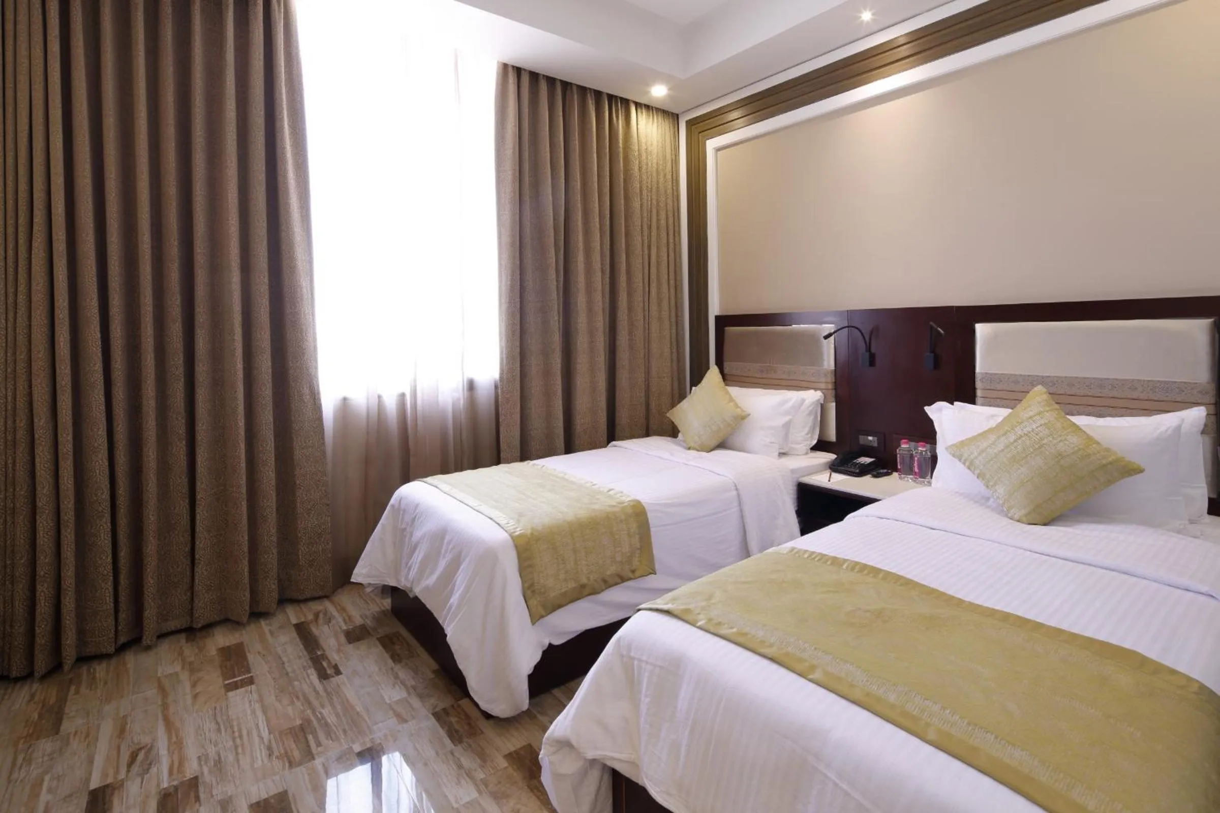 Bed in Regenta Inn Ranip Ahmedabad