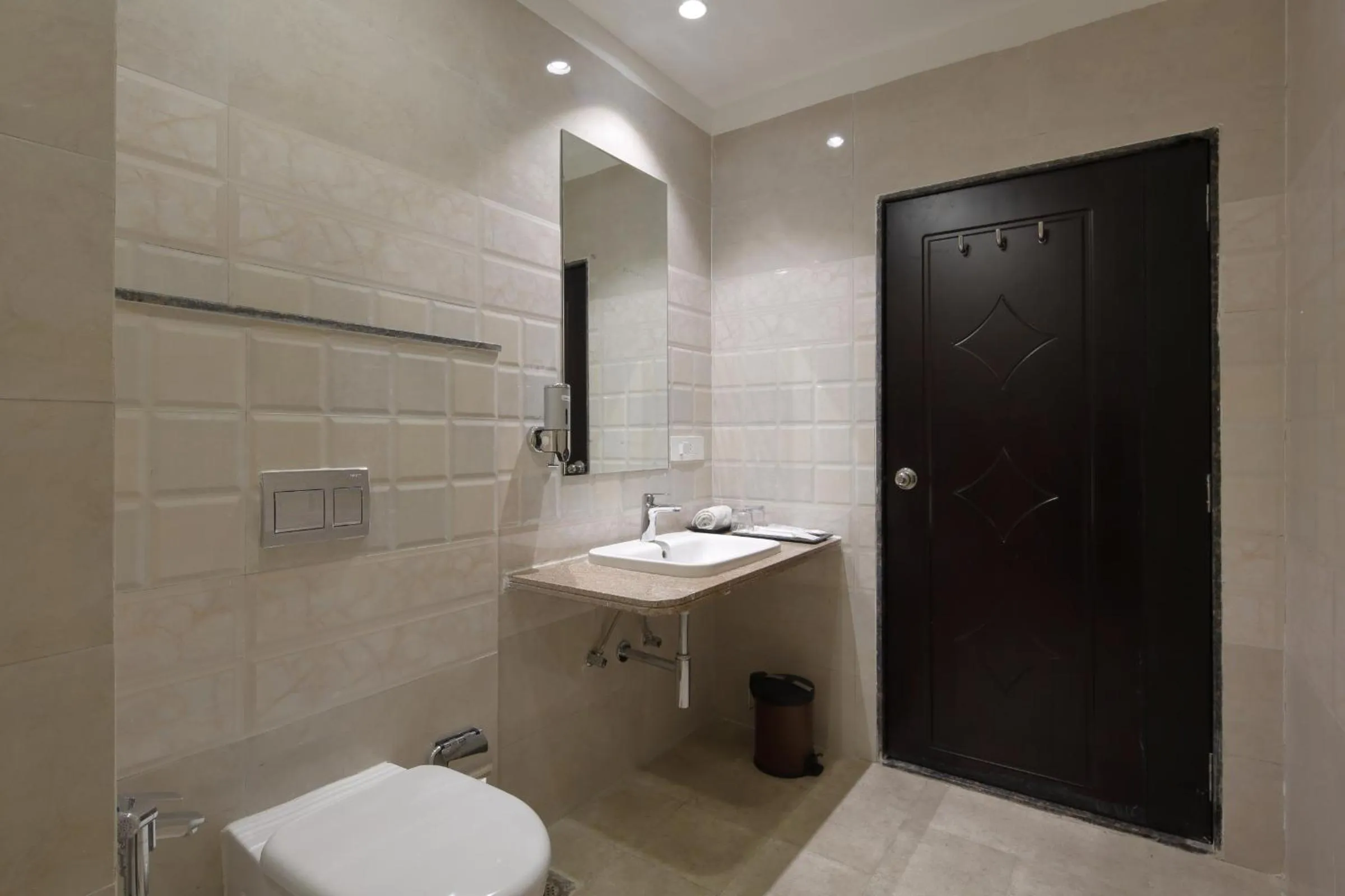 Bathroom in Regenta Inn Ranip Ahmedabad