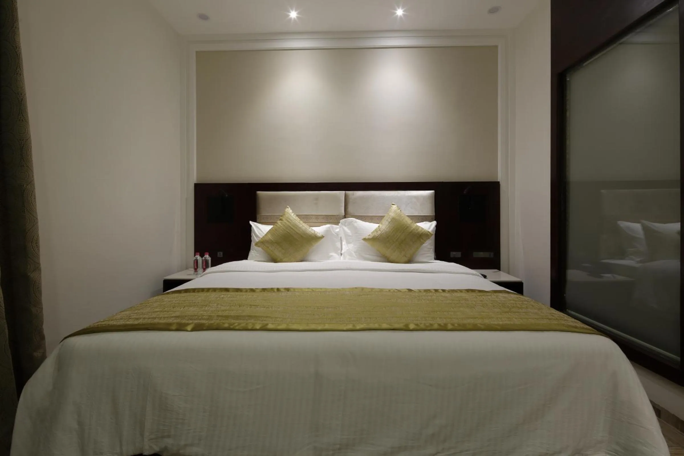 View (from property/room), Bed in Regenta Inn Ranip Ahmedabad