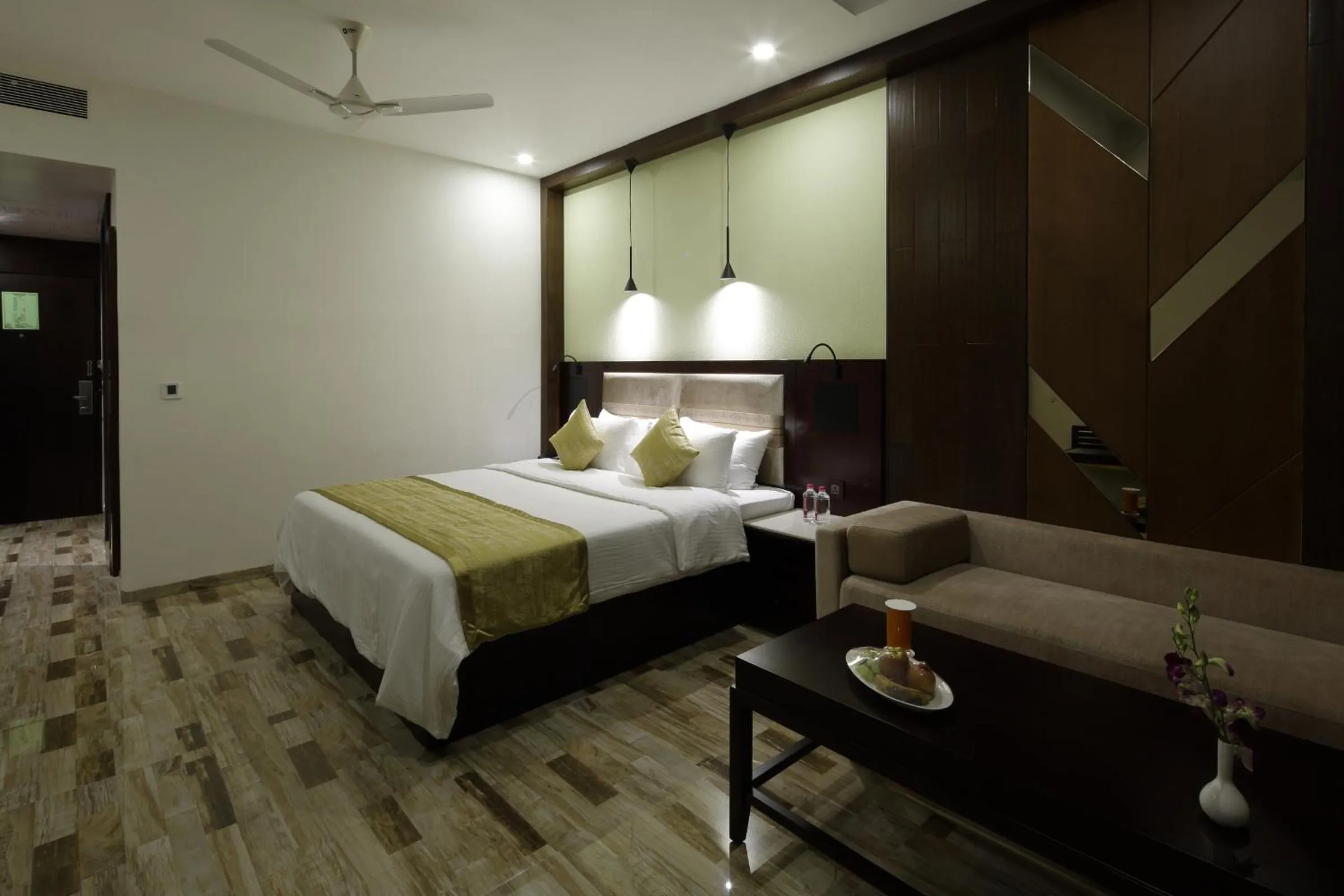 Photo of the whole room, Bed in Regenta Inn Ranip Ahmedabad