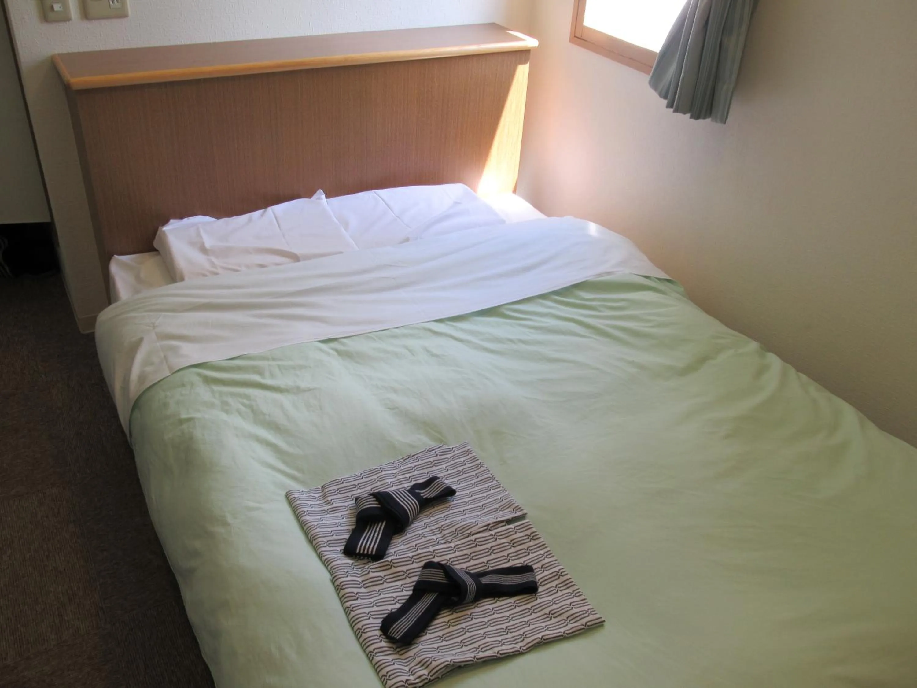 Bed in Hotel Crown Hills Kitami Annex