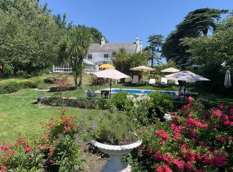 Swimming pool in Cedar House Boutique B&B