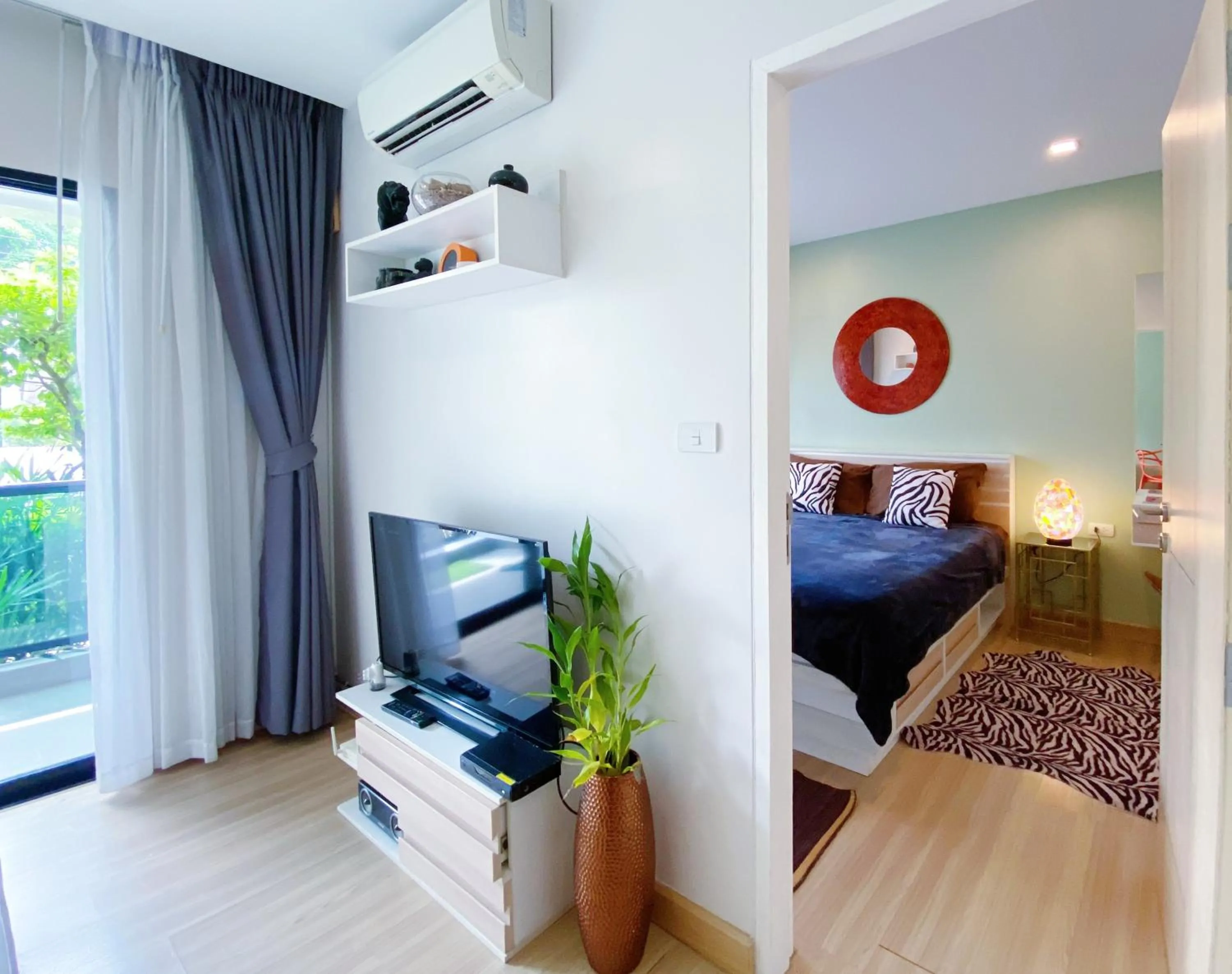 Living room in Wow 2 Br Apt Seaview, Pool, Gym, walk to beautiful Nai Yang Beach