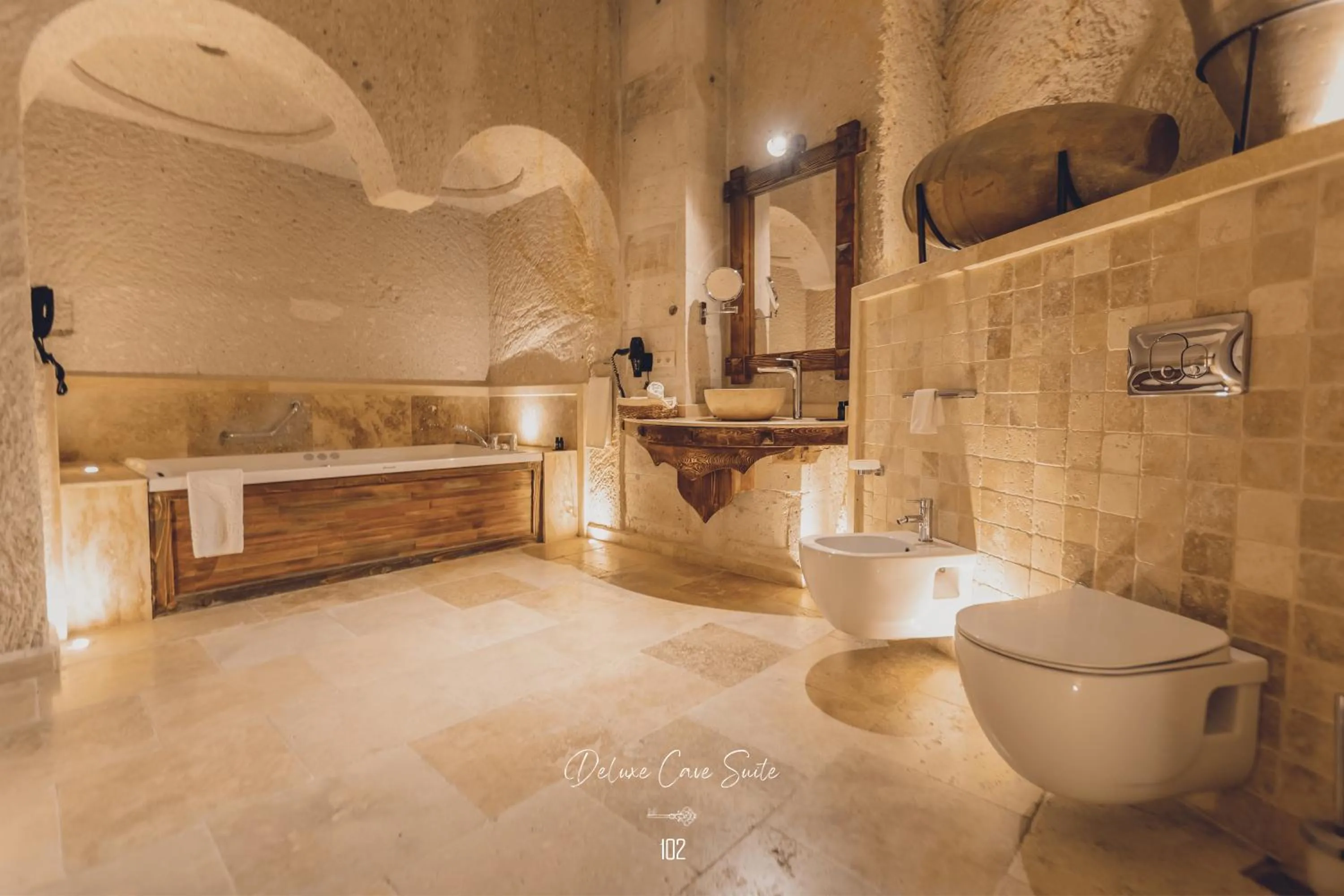 Shower in Nino Cave Suites