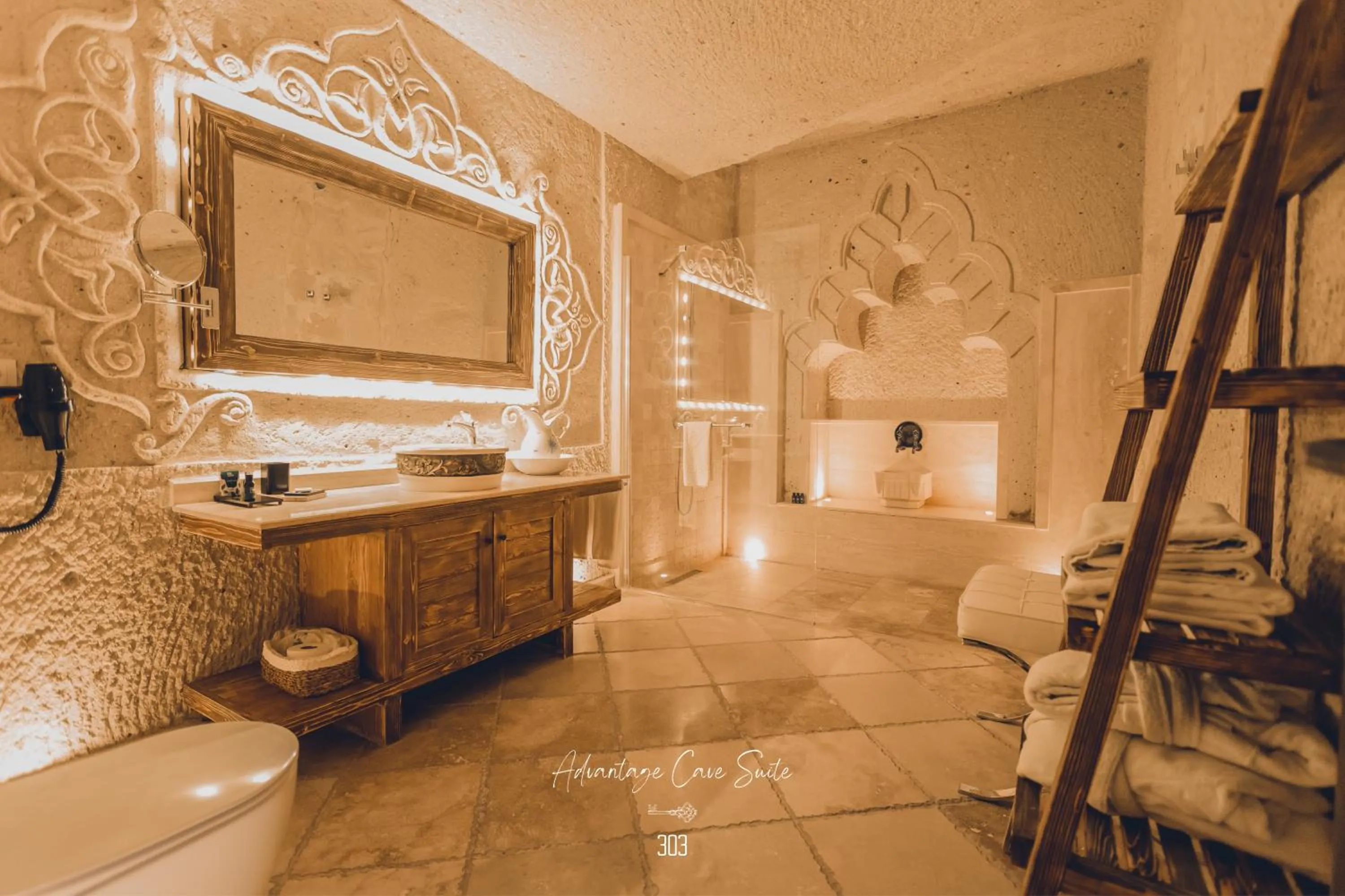 Shower in Nino Cave Suites