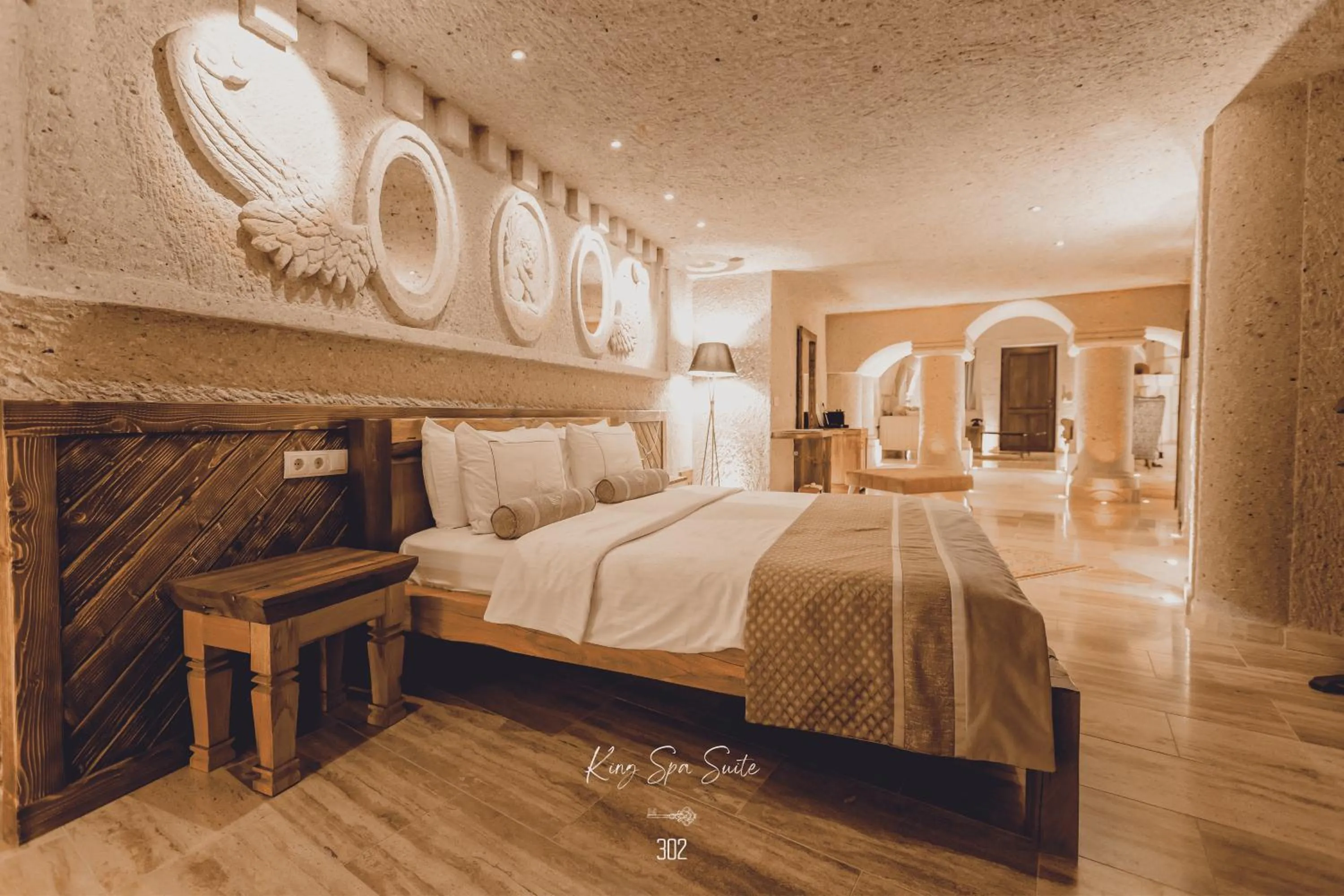 Bed in Nino Cave Suites