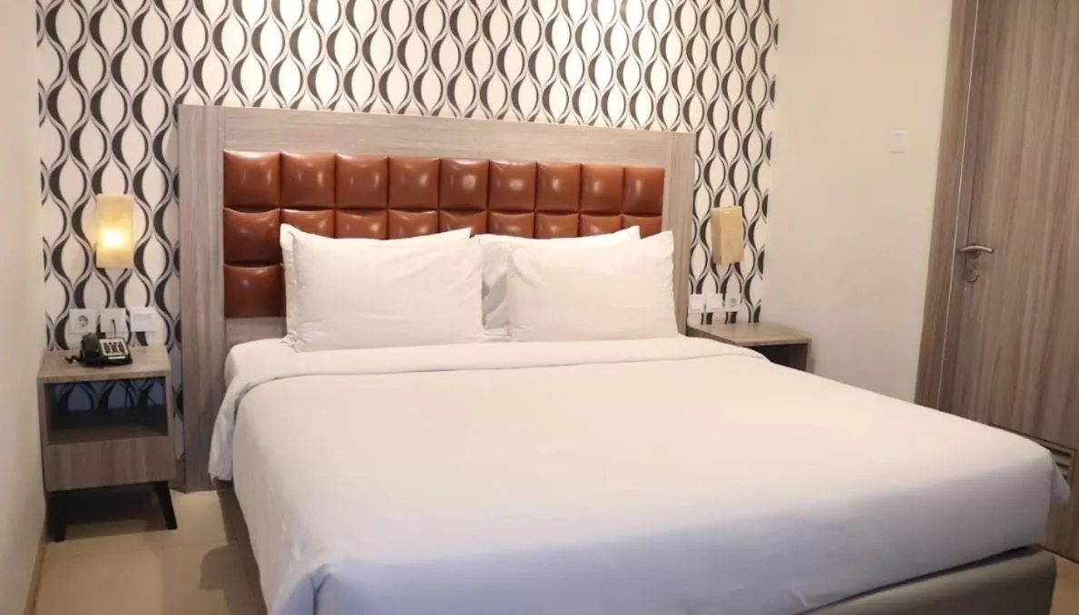 Bed in Pakons Prime Hotel