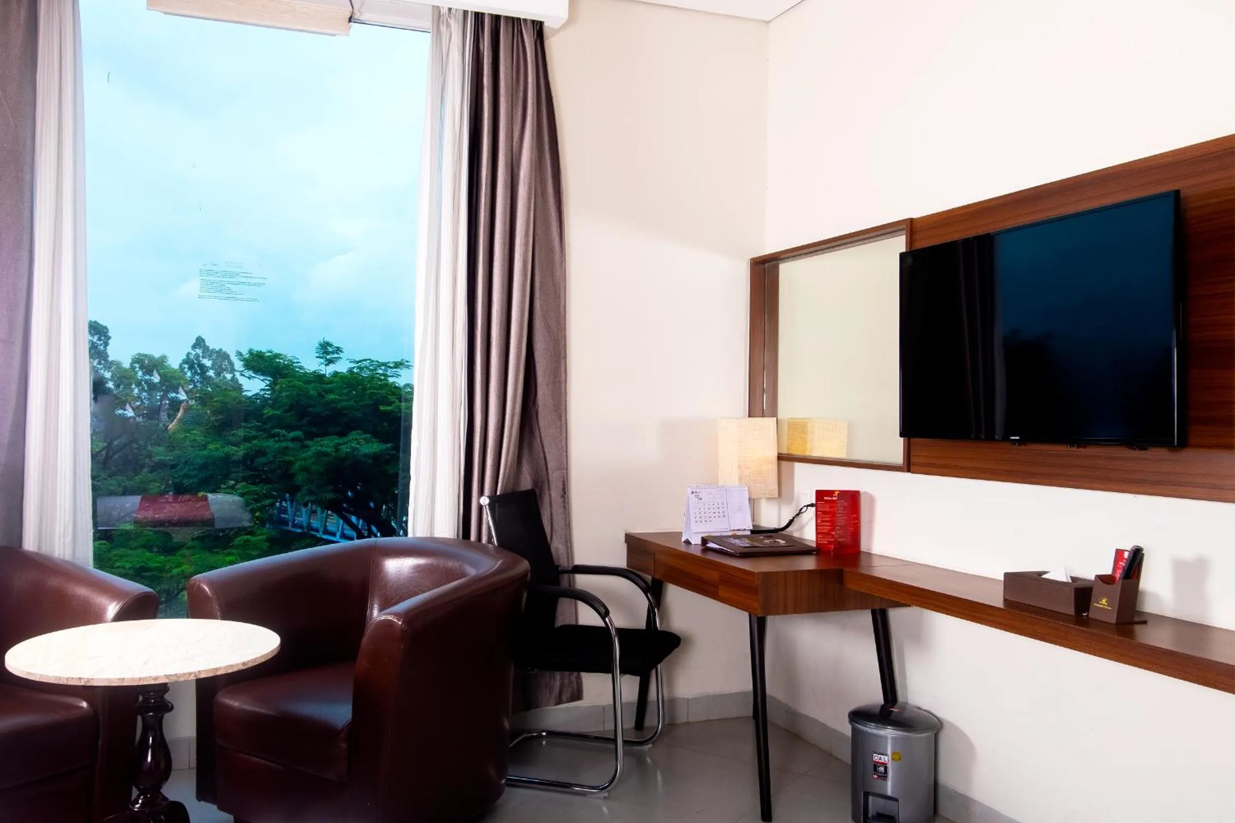 Living room in Pakons Prime Hotel