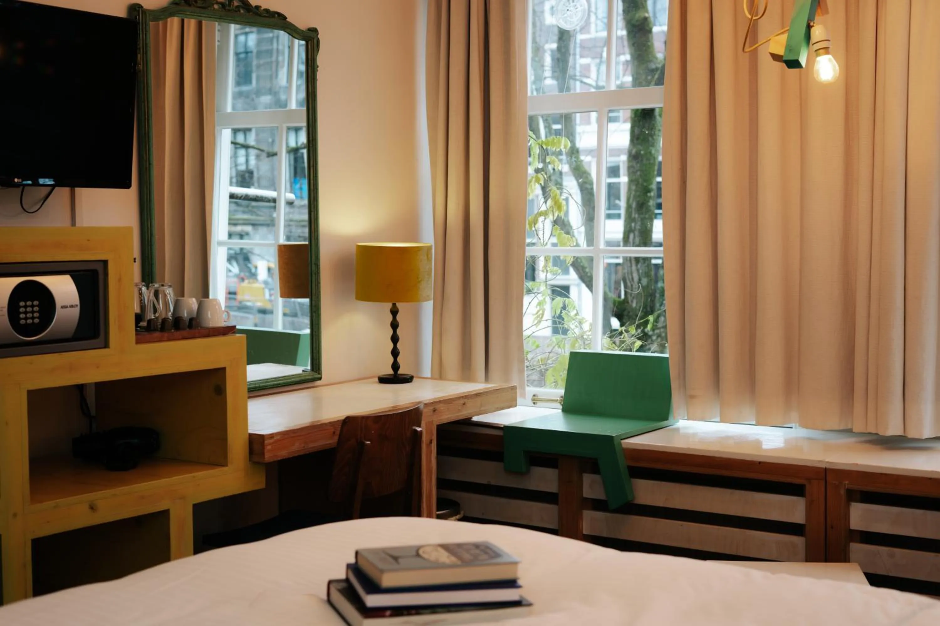 Bed in Rosalia's Menagerie Cocktail bar & InnUpstairs