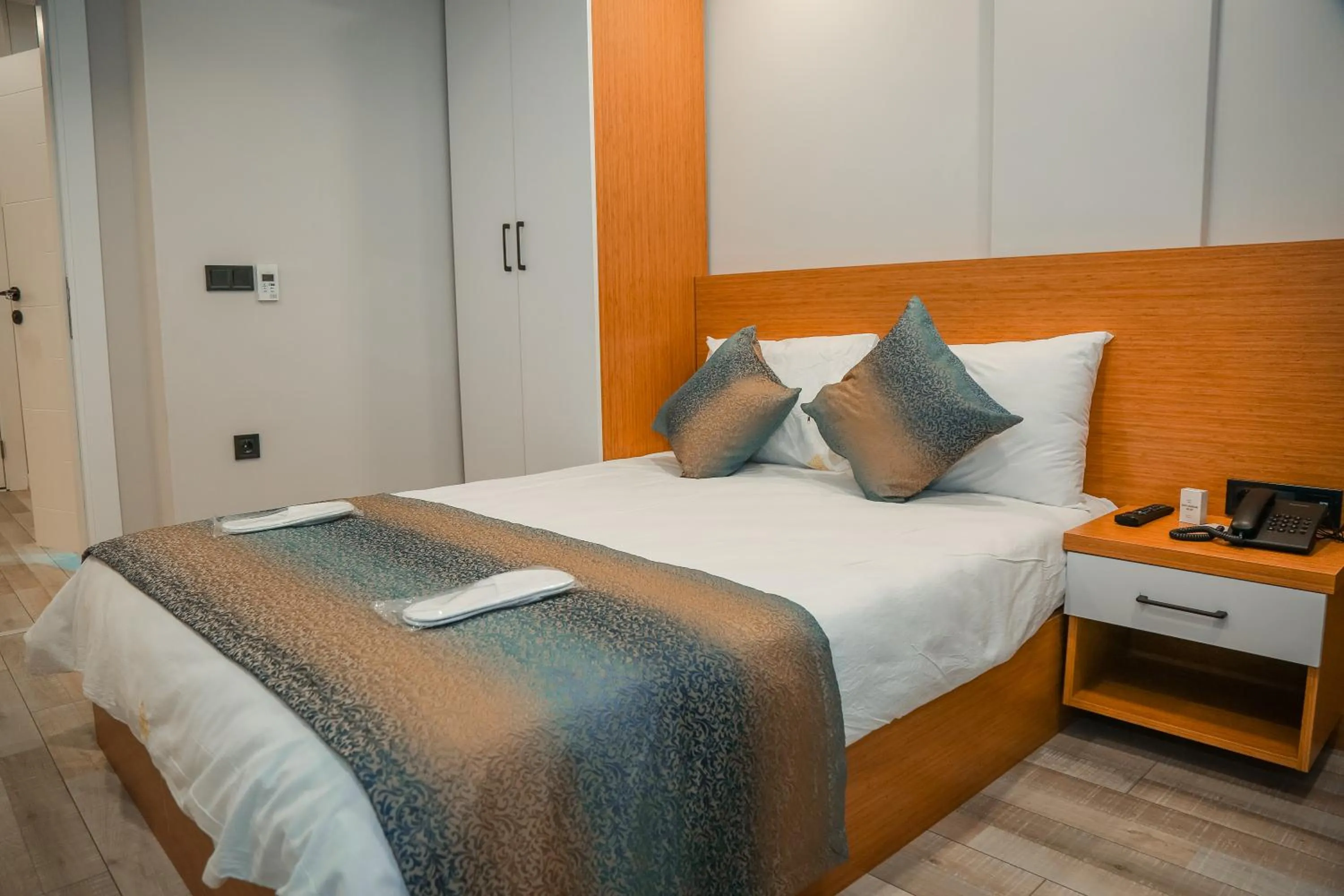 Photo of the whole room, Bed in White Golden Suite Hotel