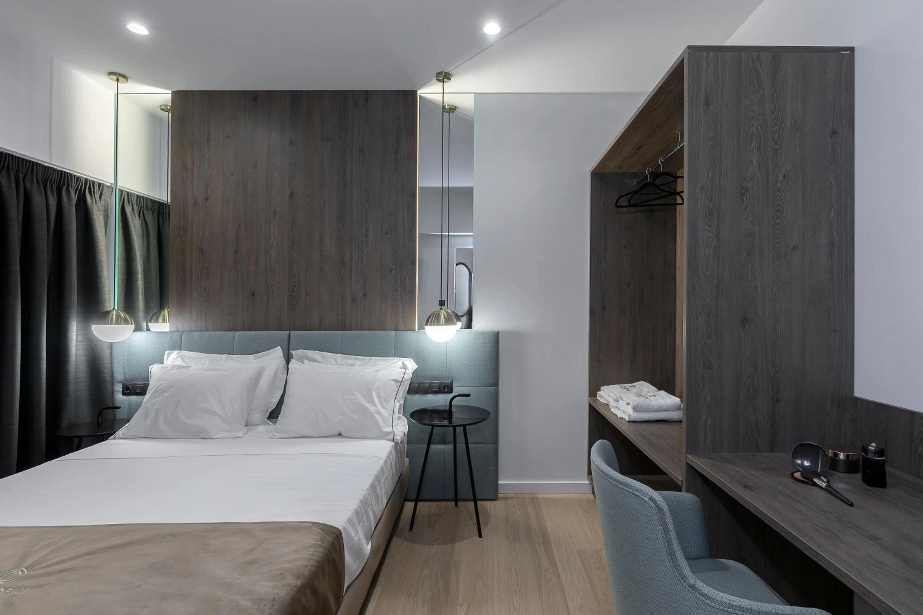 Bed in Philosofia Athens Suites