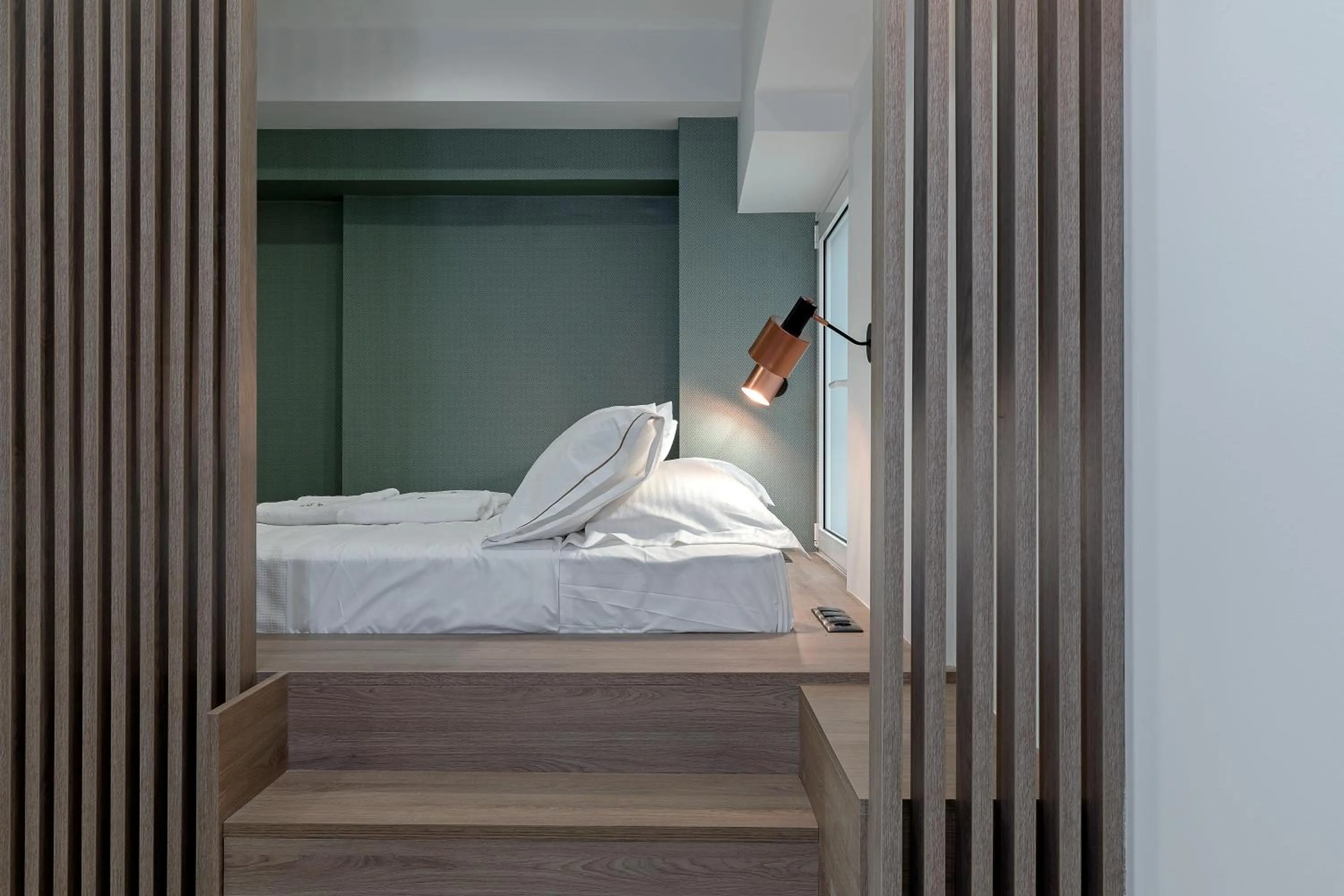Bed in Philosofia Athens Suites