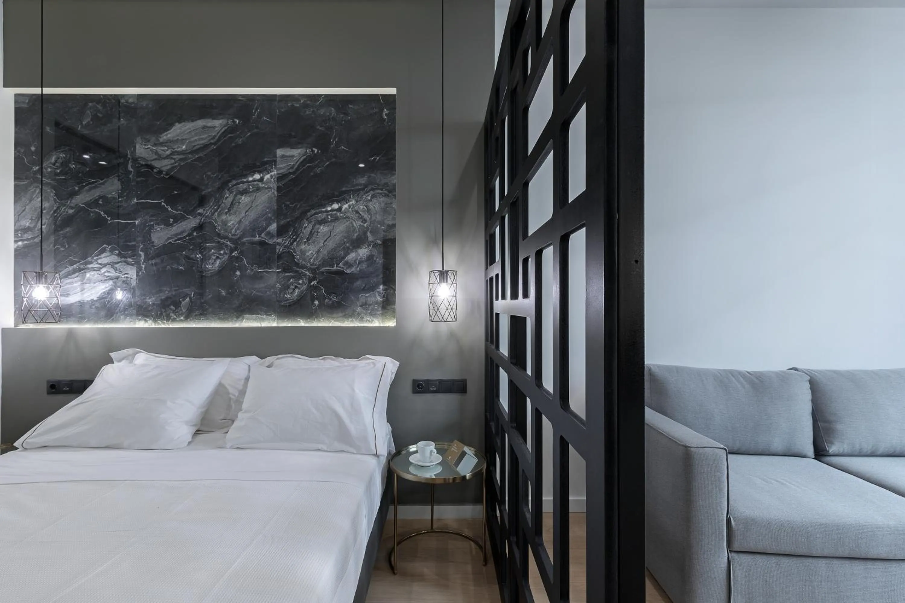 Bed in Philosofia Athens Suites