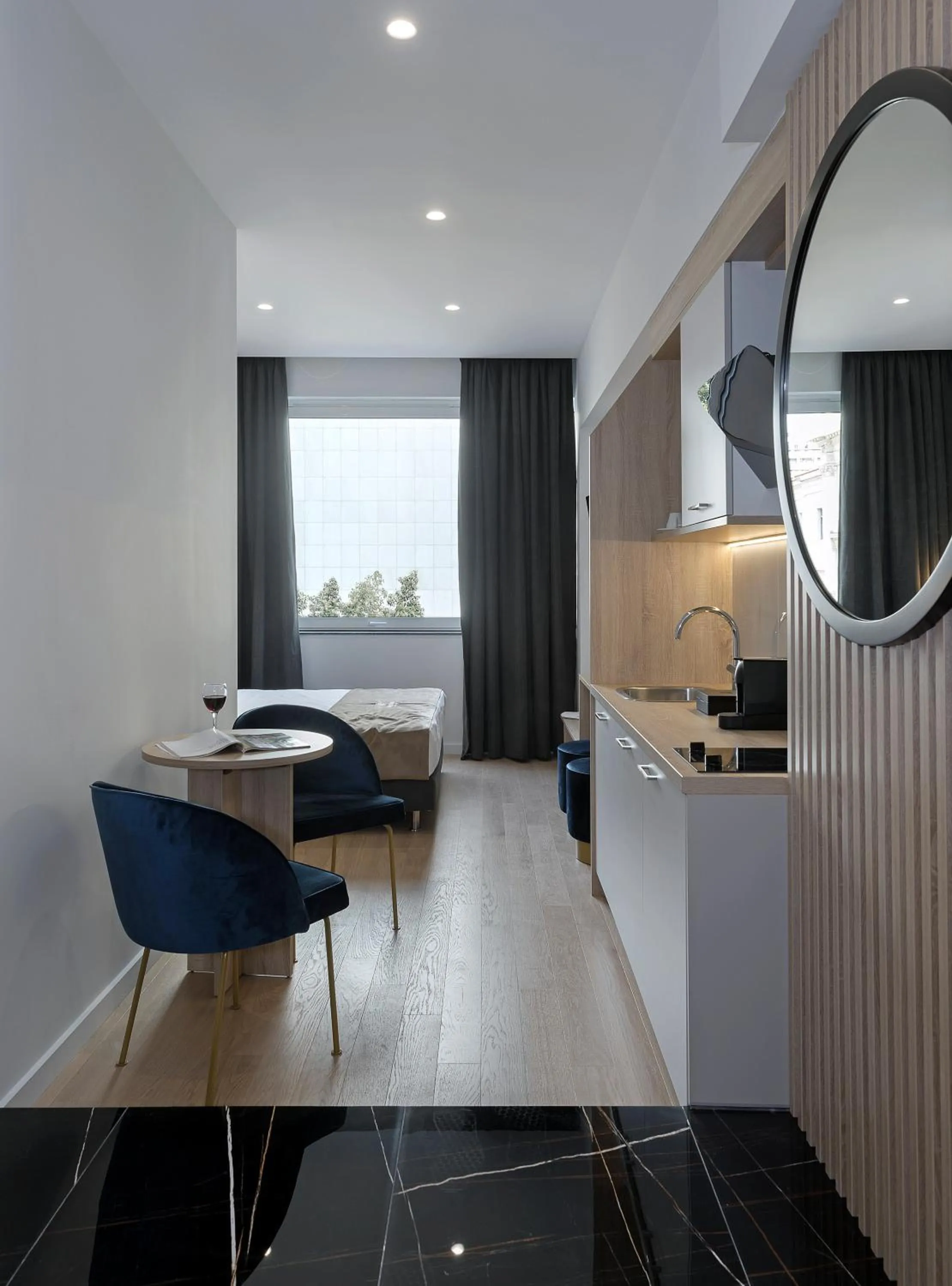 Kitchen or kitchenette in Philosofia Athens Suites