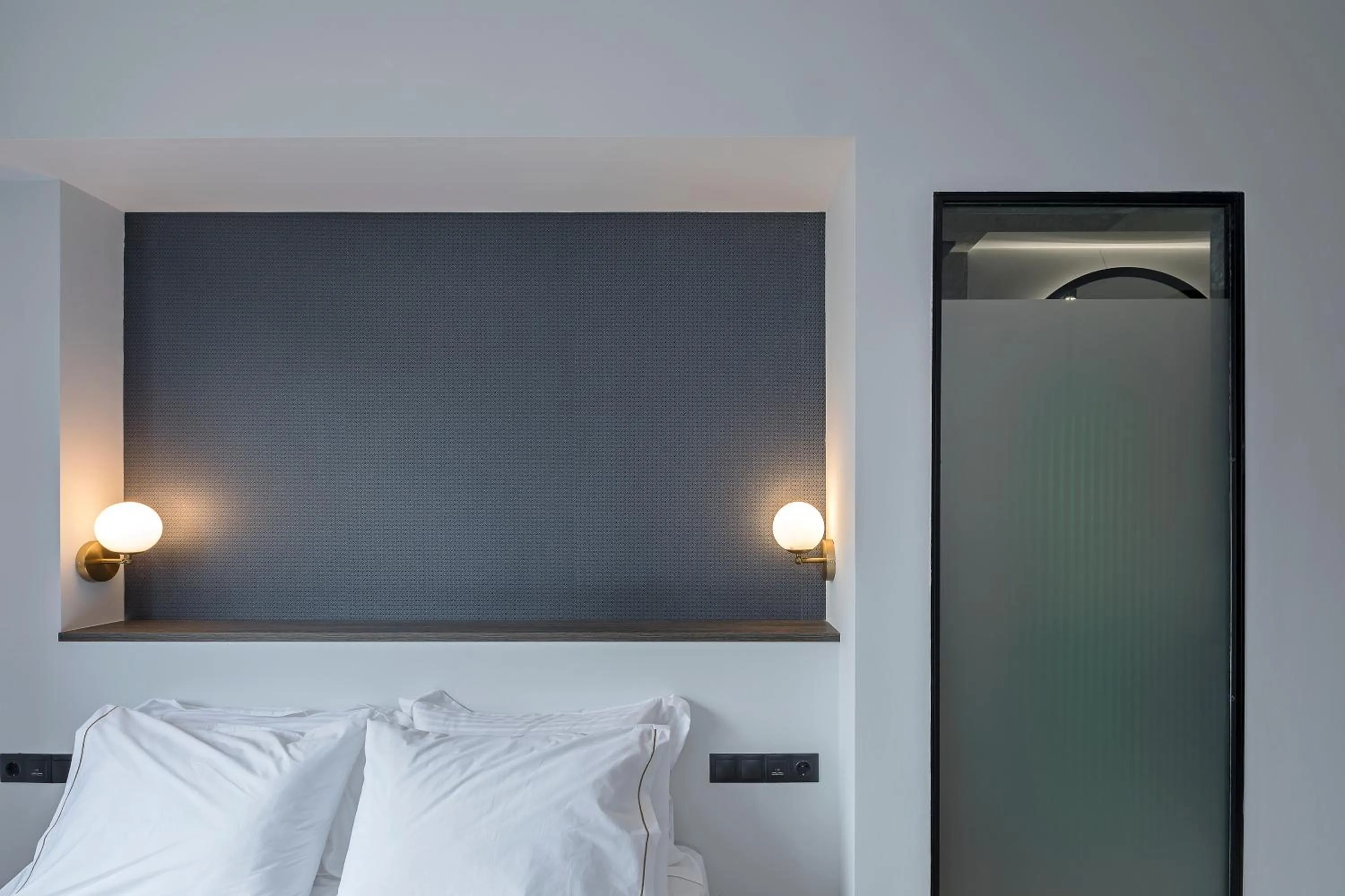 Bed in Philosofia Athens Suites