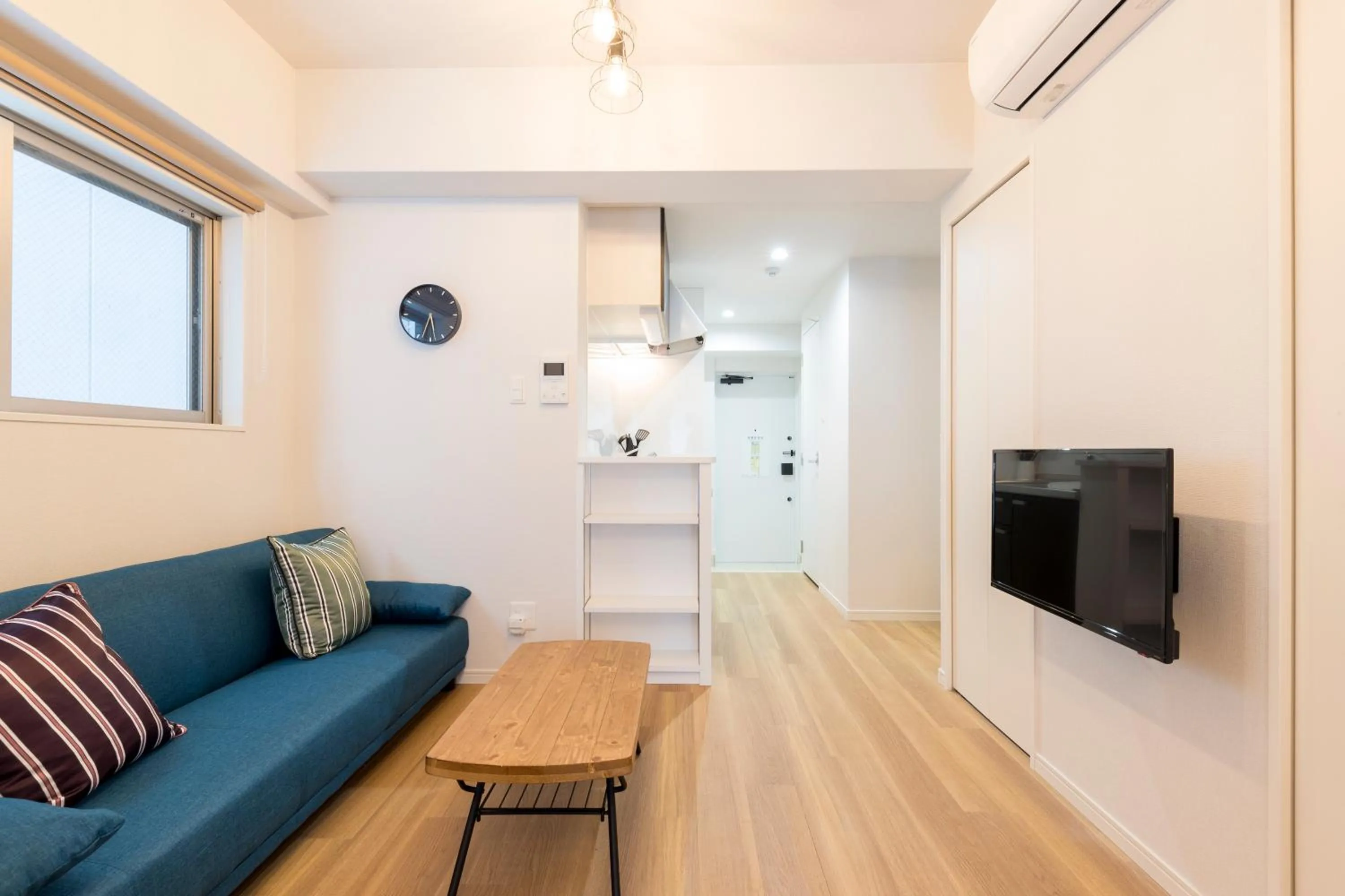 Communal lounge/ TV room in SG Residence Inn Hakataekiminami