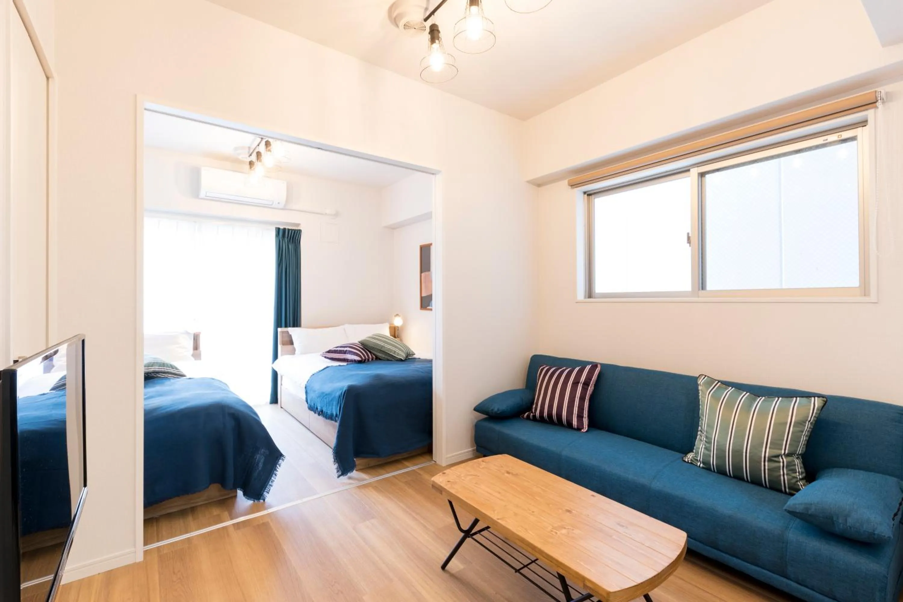 Living room, Bed in Hotel Ritza HAKATA