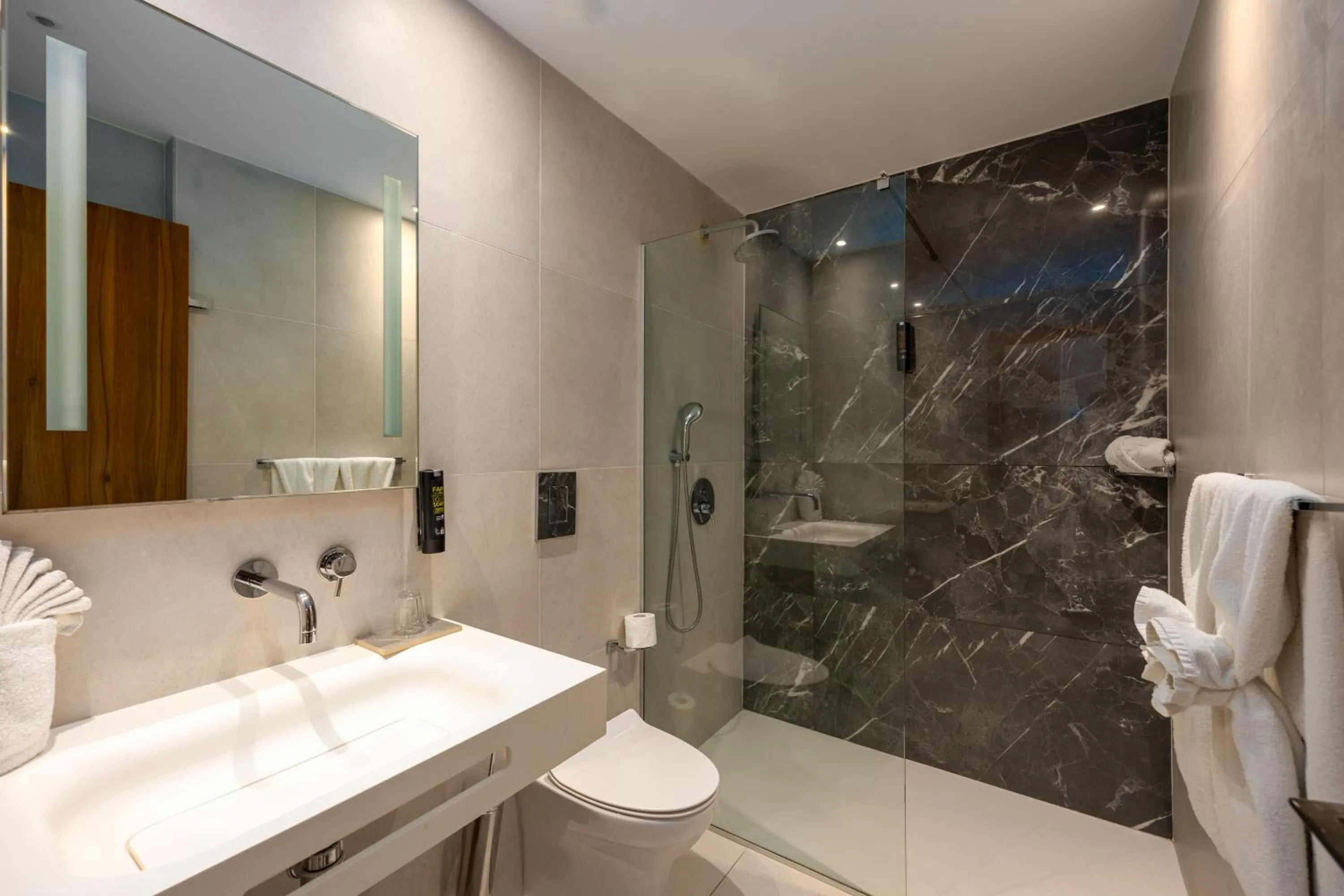 Bathroom in Melpo Antia Hotel & Suites