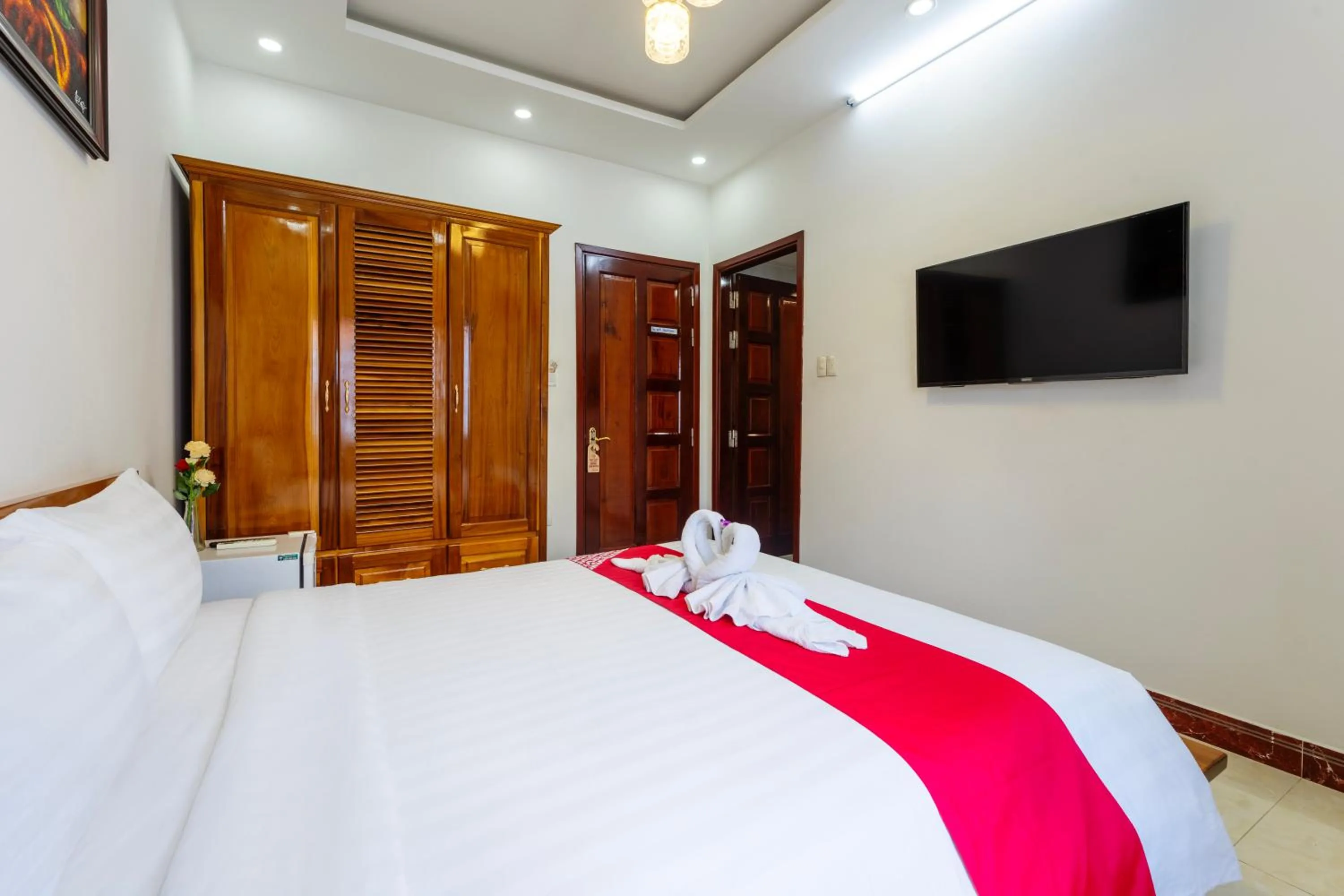 Communal lounge/ TV room, Bed in Hoi An Legend Connect Villa