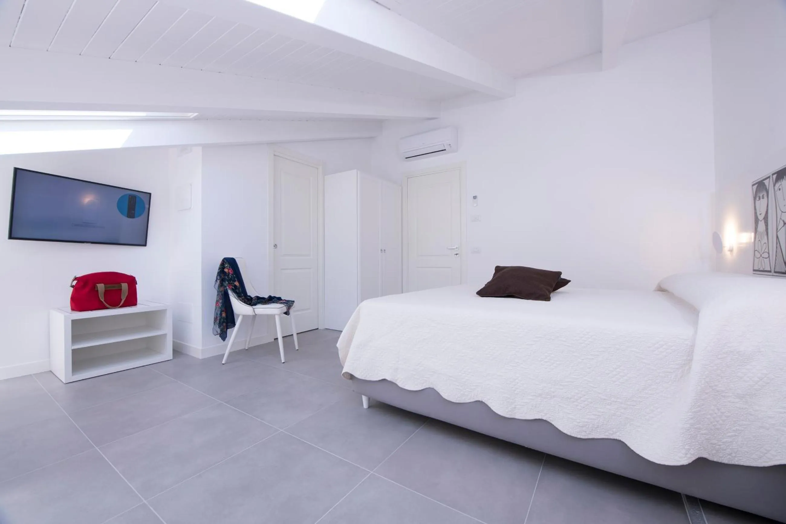 Bed in Zia Pupetta Suites