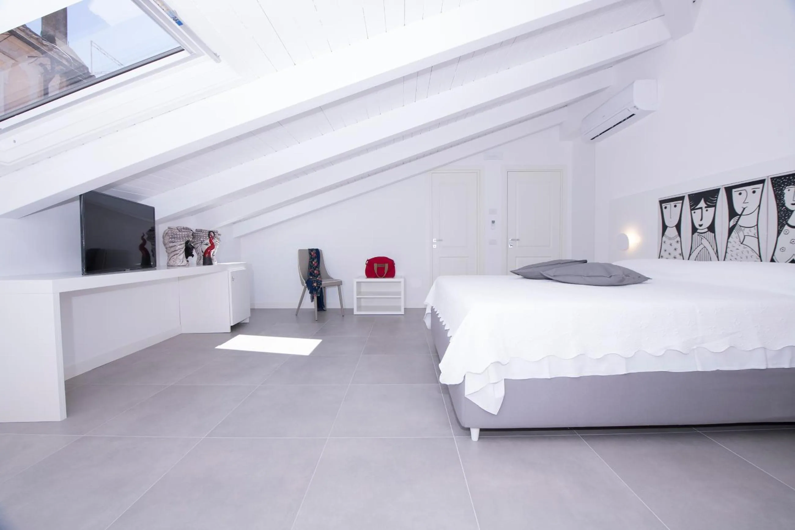 Bed in Zia Pupetta Suites