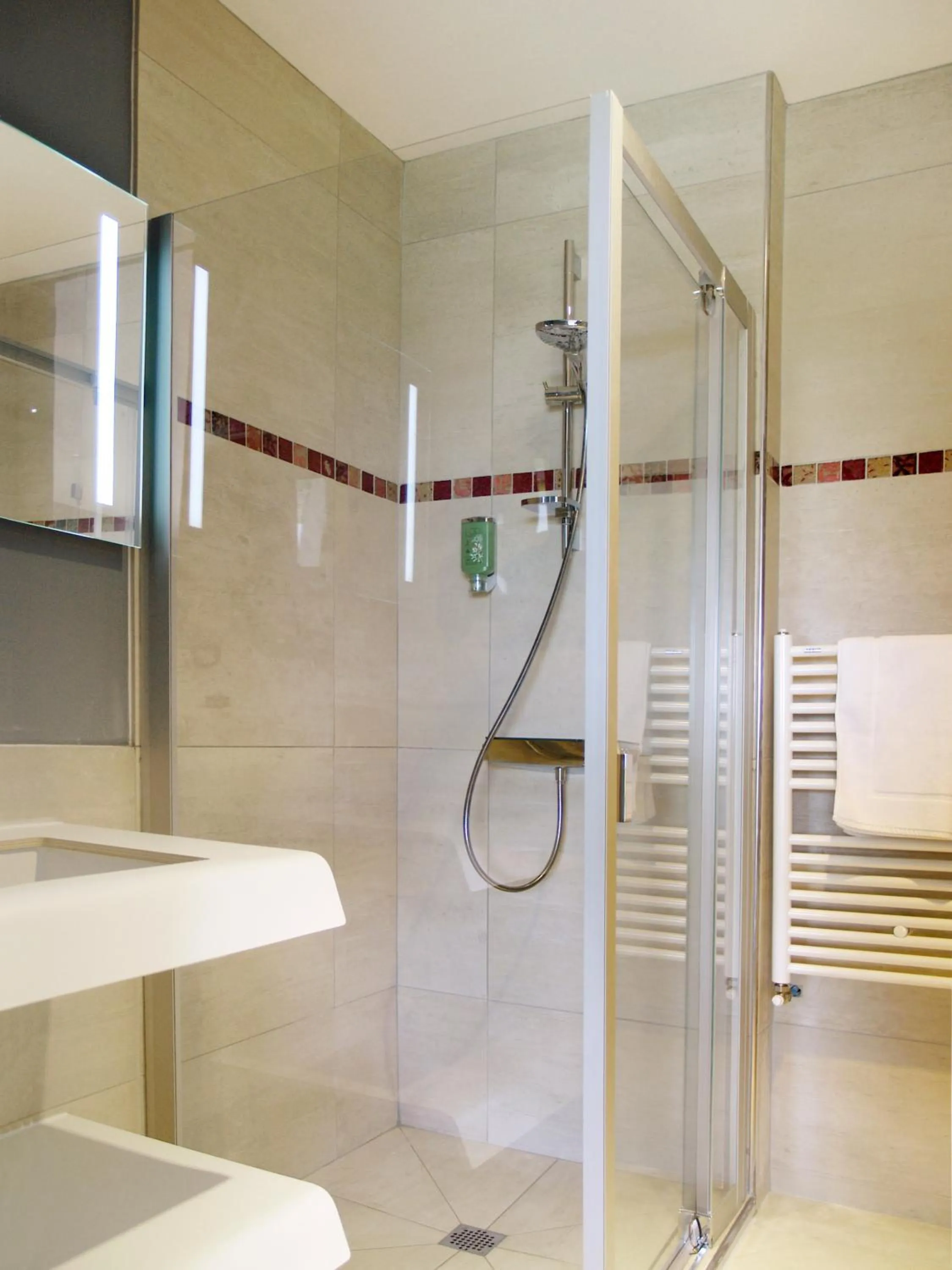 Shower in Logis Le Château de Sable