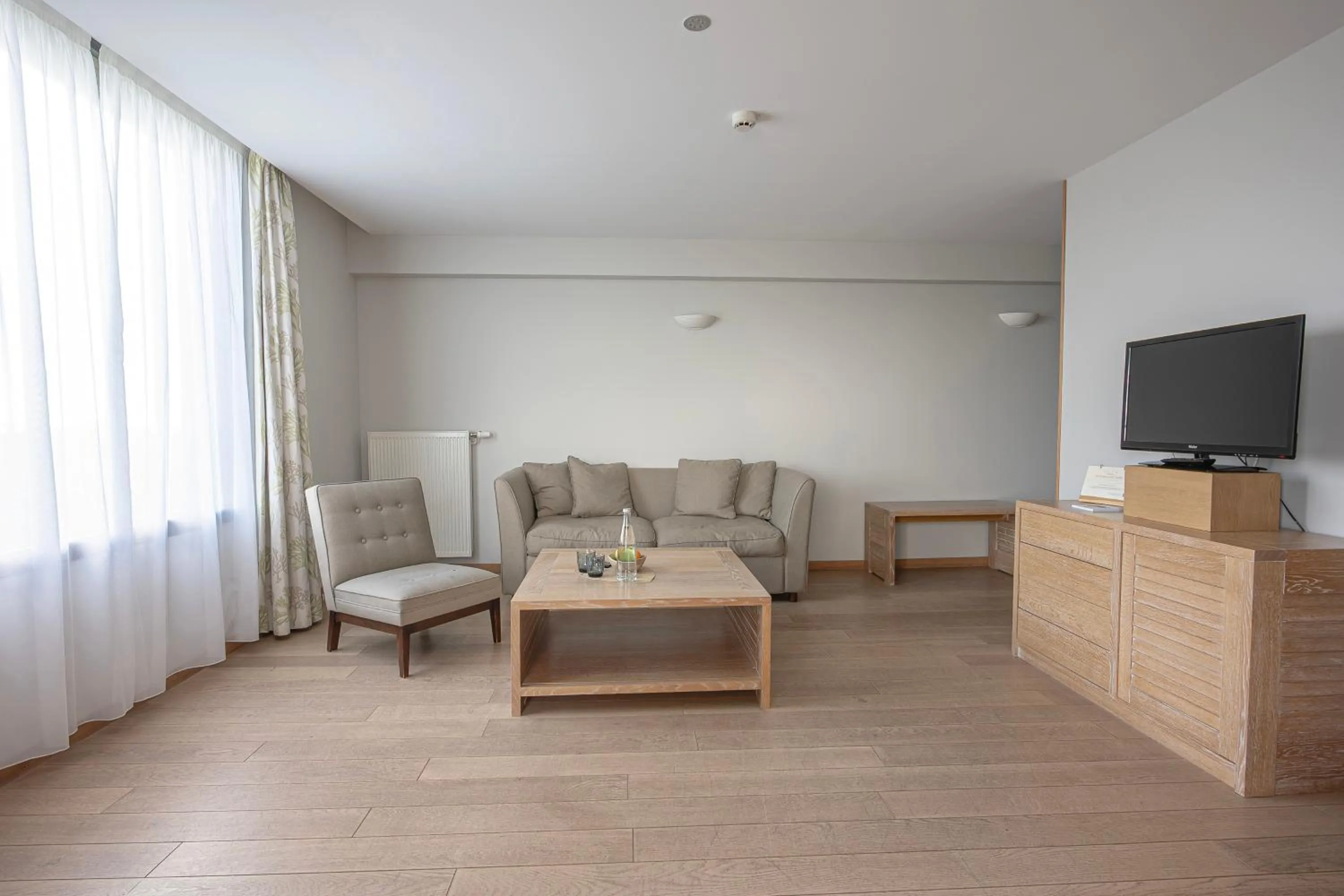 Seating area in Logis Le Château de Sable