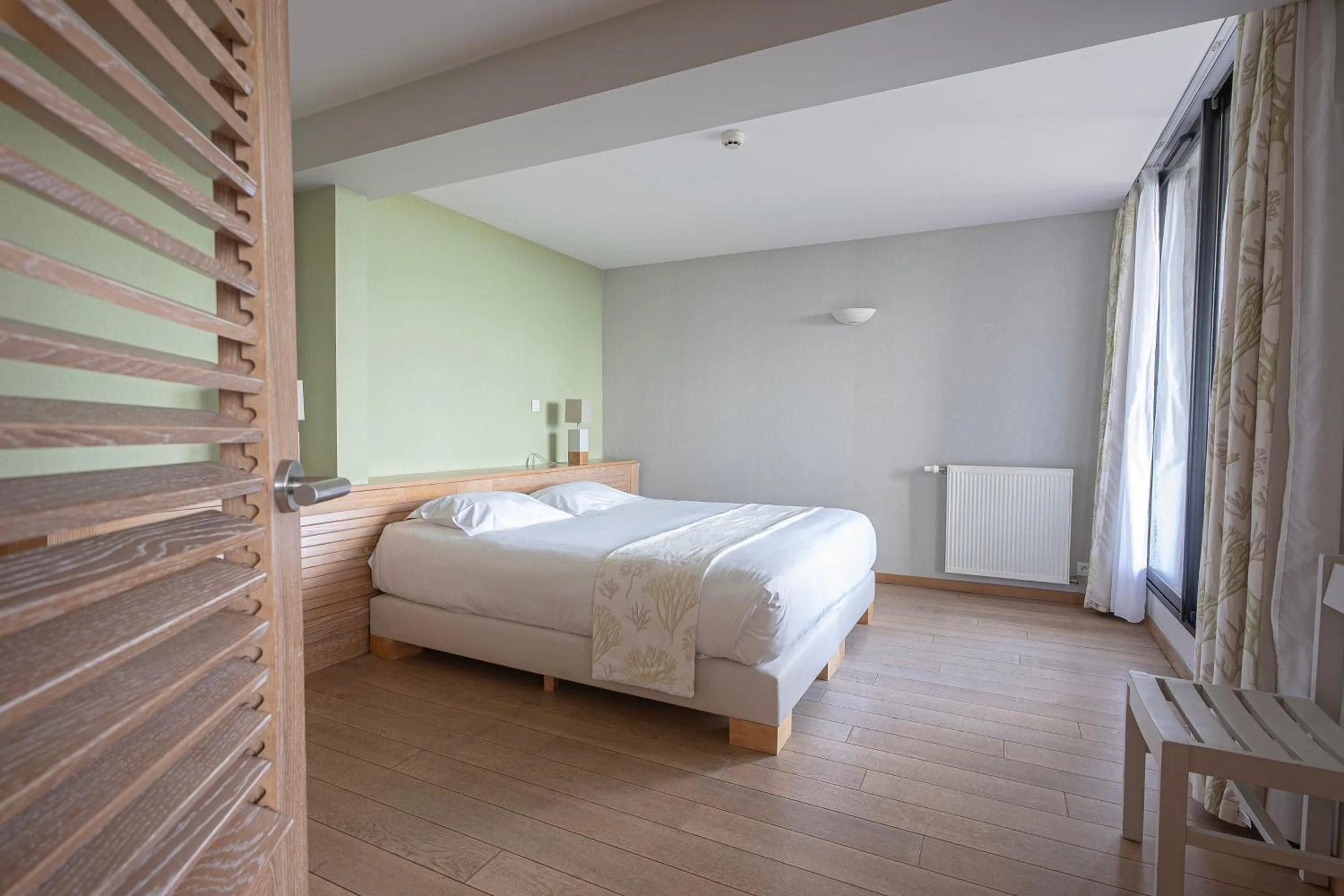 Bed in Logis Le Château de Sable