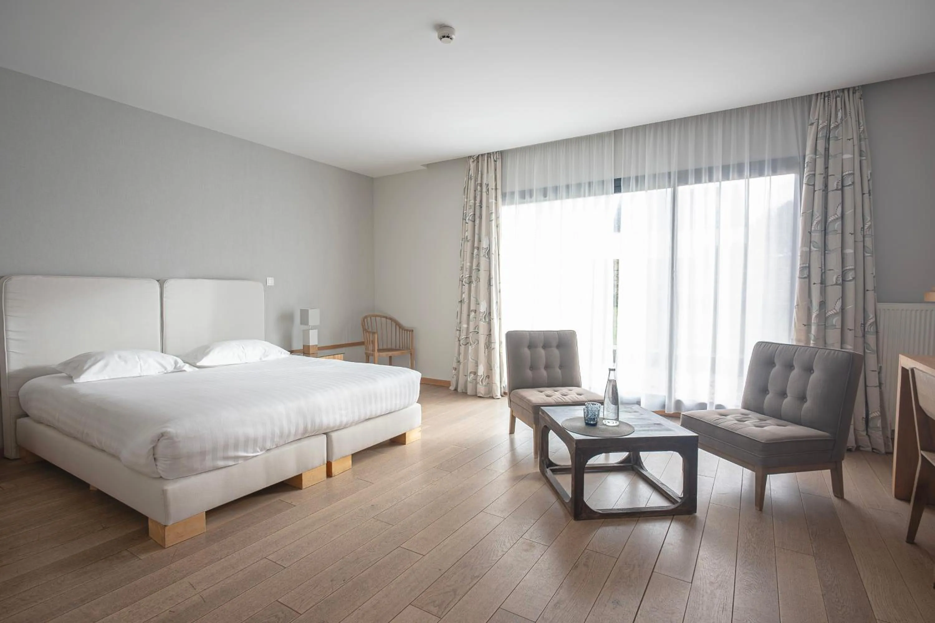 Garden view, Bed in Logis Le Château de Sable