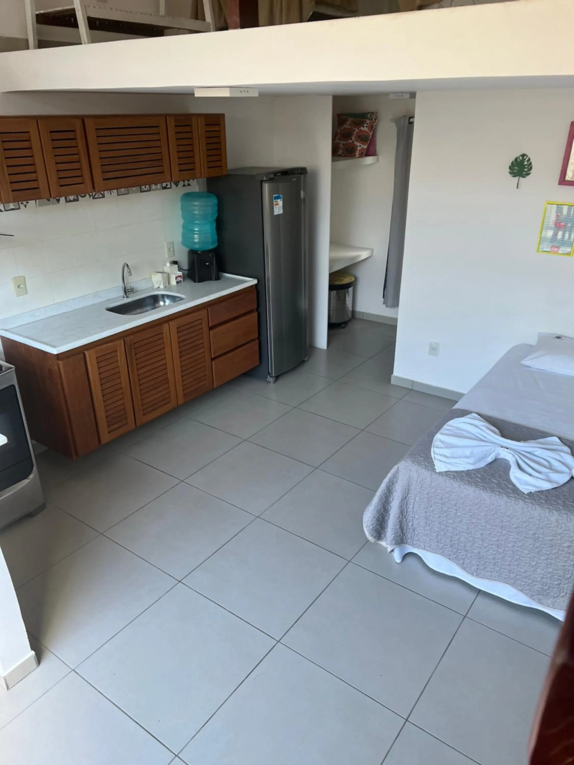 Bed in Pousada Três Pescadores