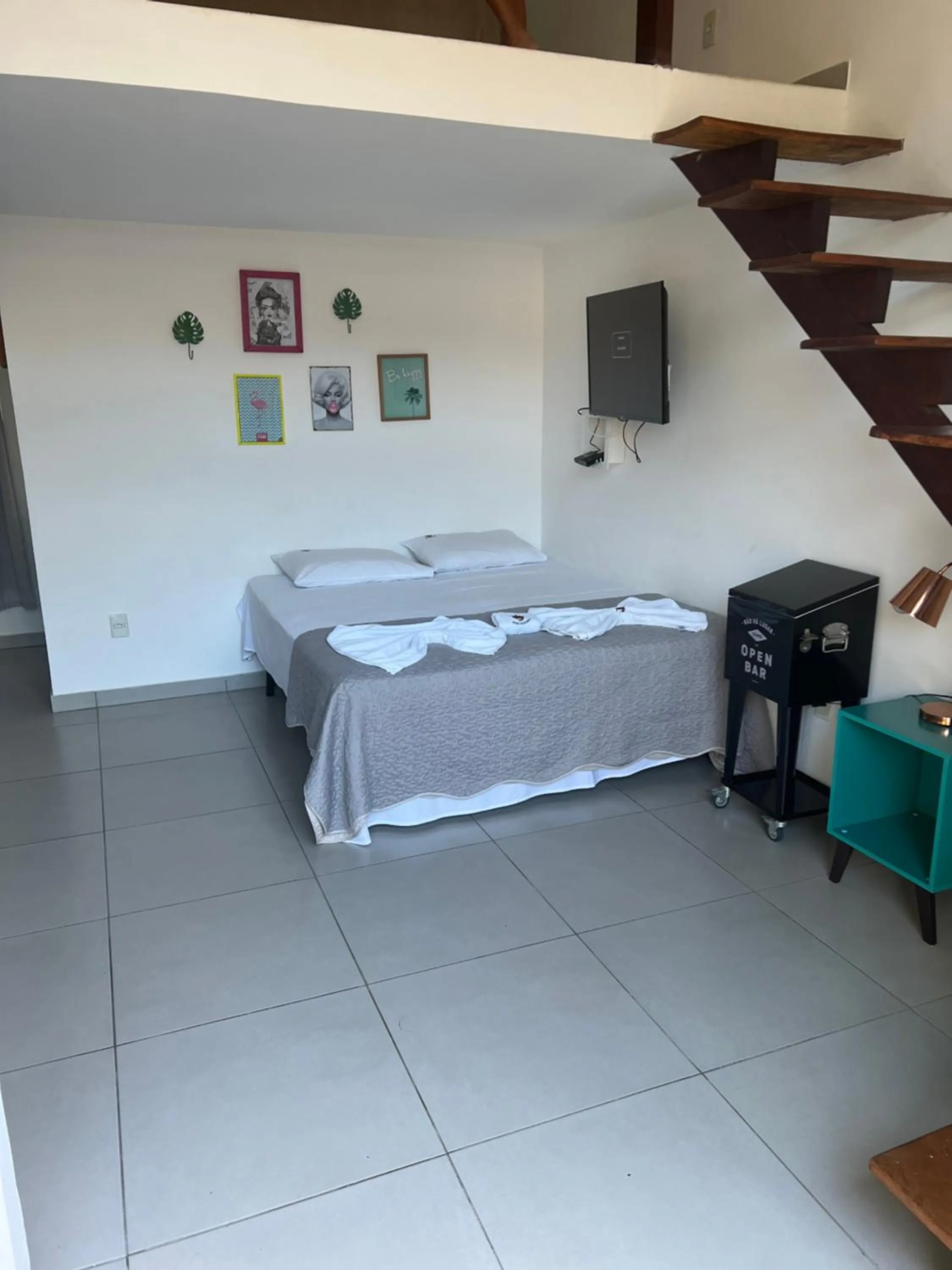 Bed in Pousada Três Pescadores