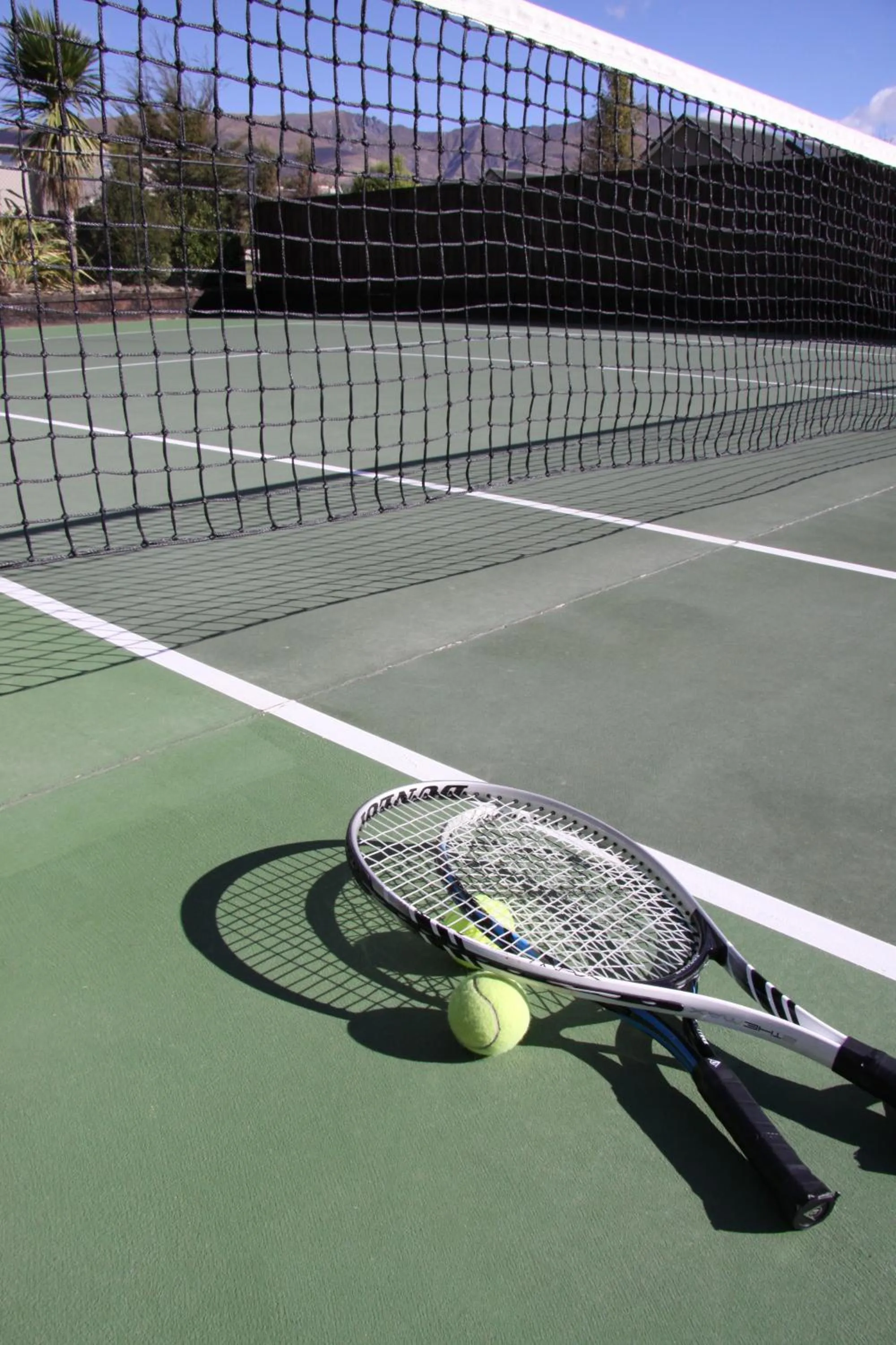 Tennis court in Alpine Resort Wanaka THC Hotels and Resorts