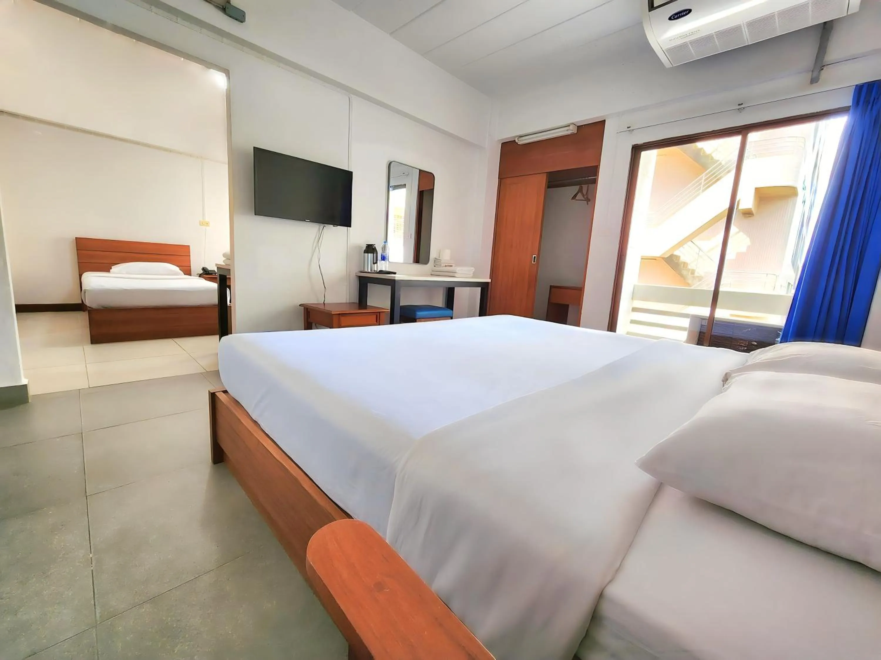 Bed in Siam Palace Hotel