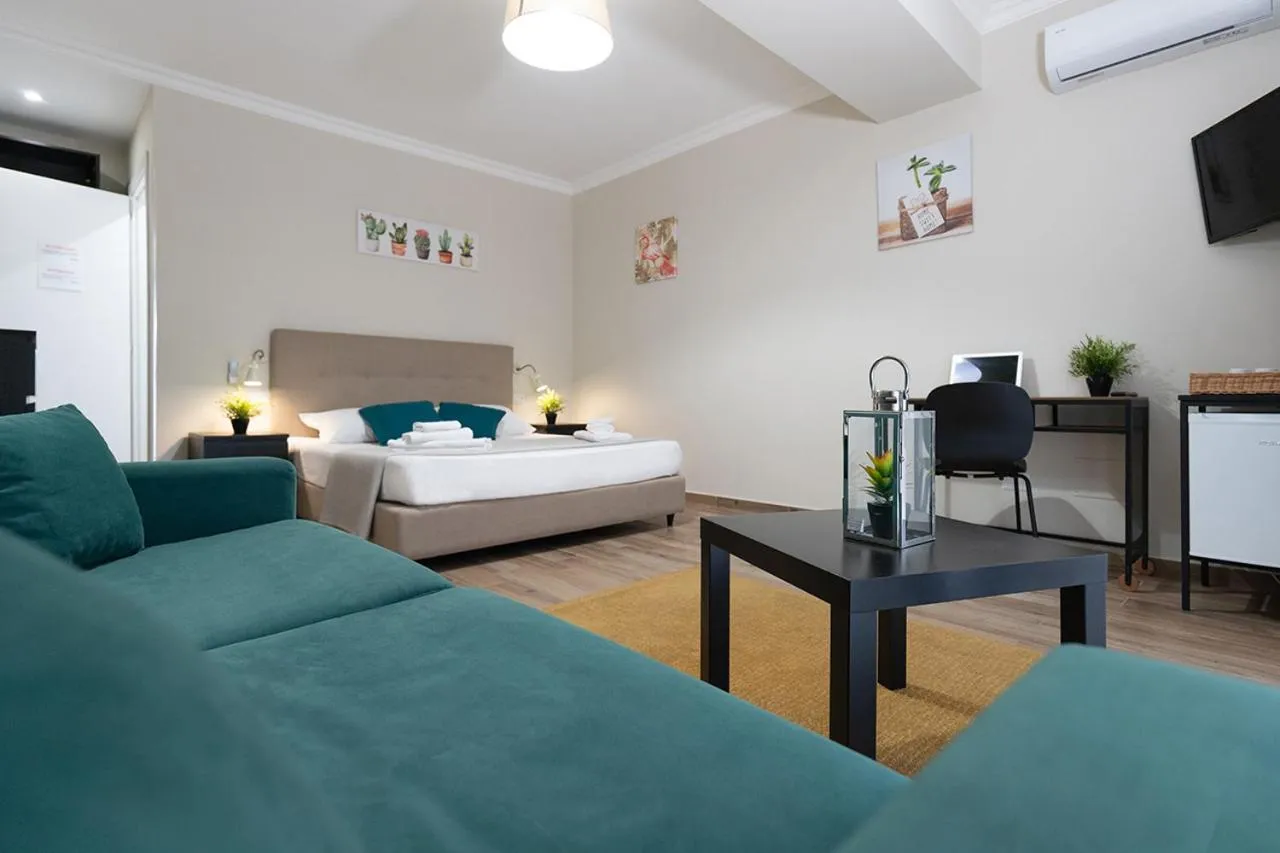 Photo of the whole room, Bed in Khome Giardini Naxos