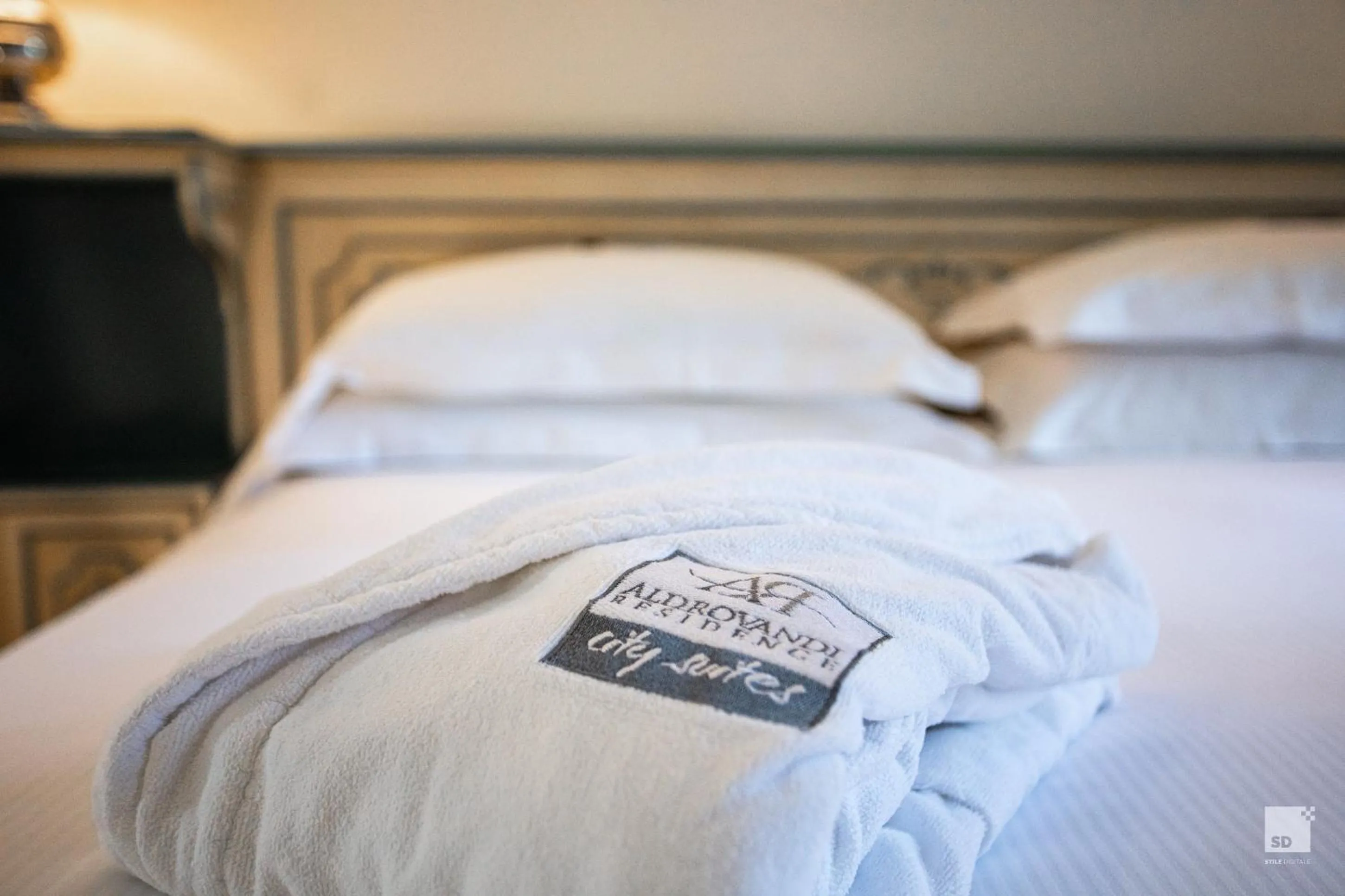 Decorative detail, Bed in Aldrovandi Residence City Suites