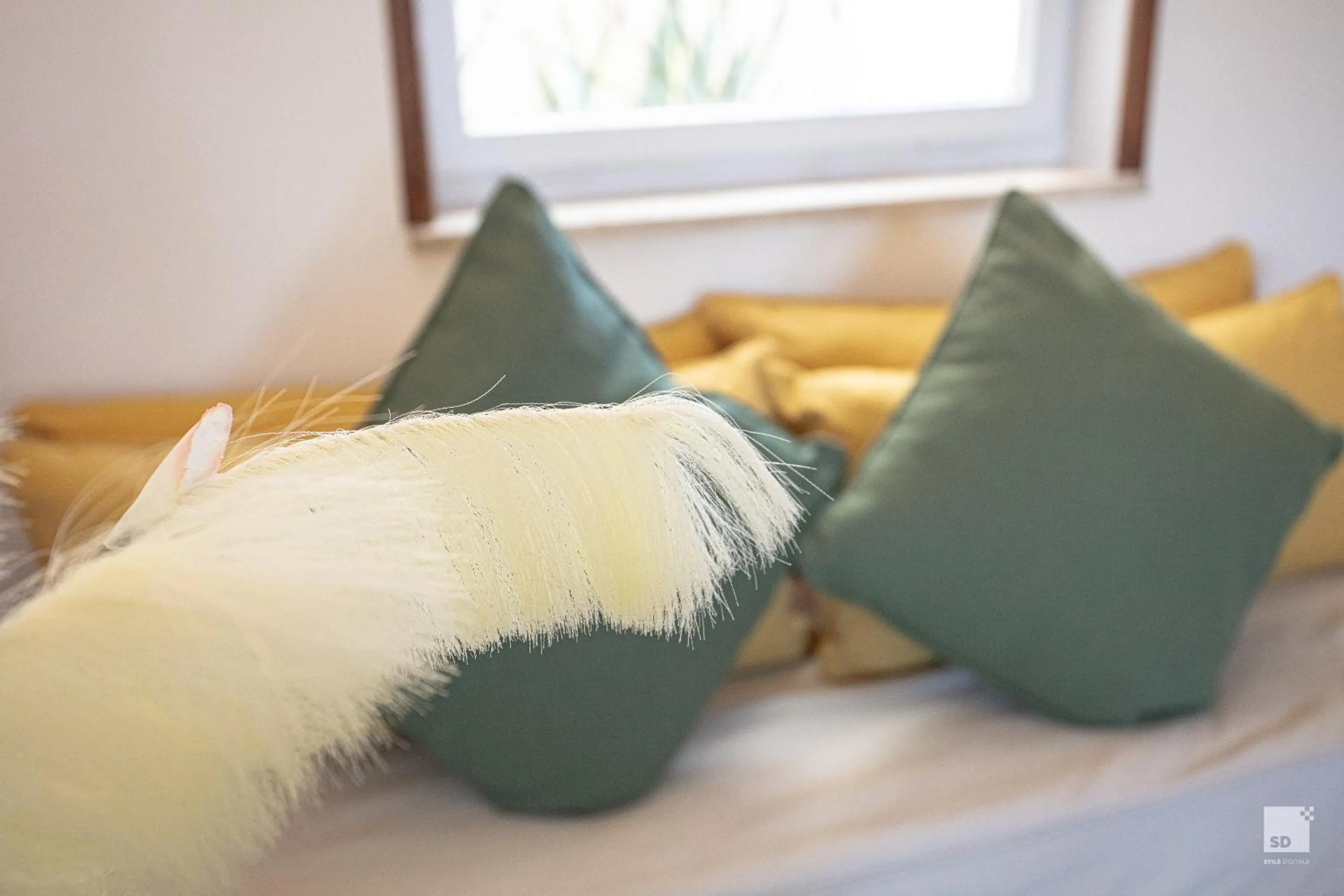 Decorative detail, Bed in Aldrovandi Residence City Suites