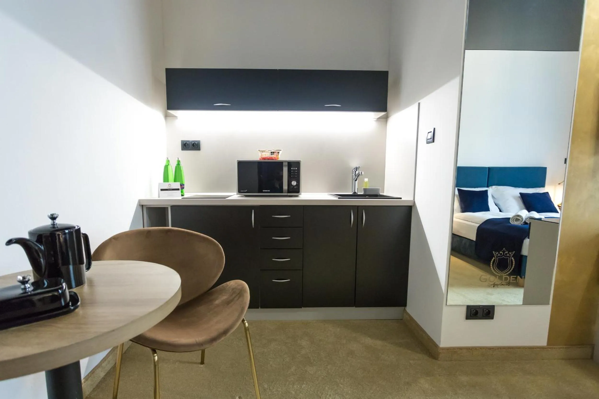 Kitchen or kitchenette in Apart Hotel GOLDEN apartments