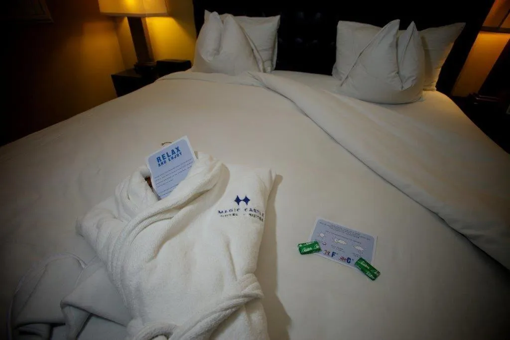 Bed in Magic Castle Hotel