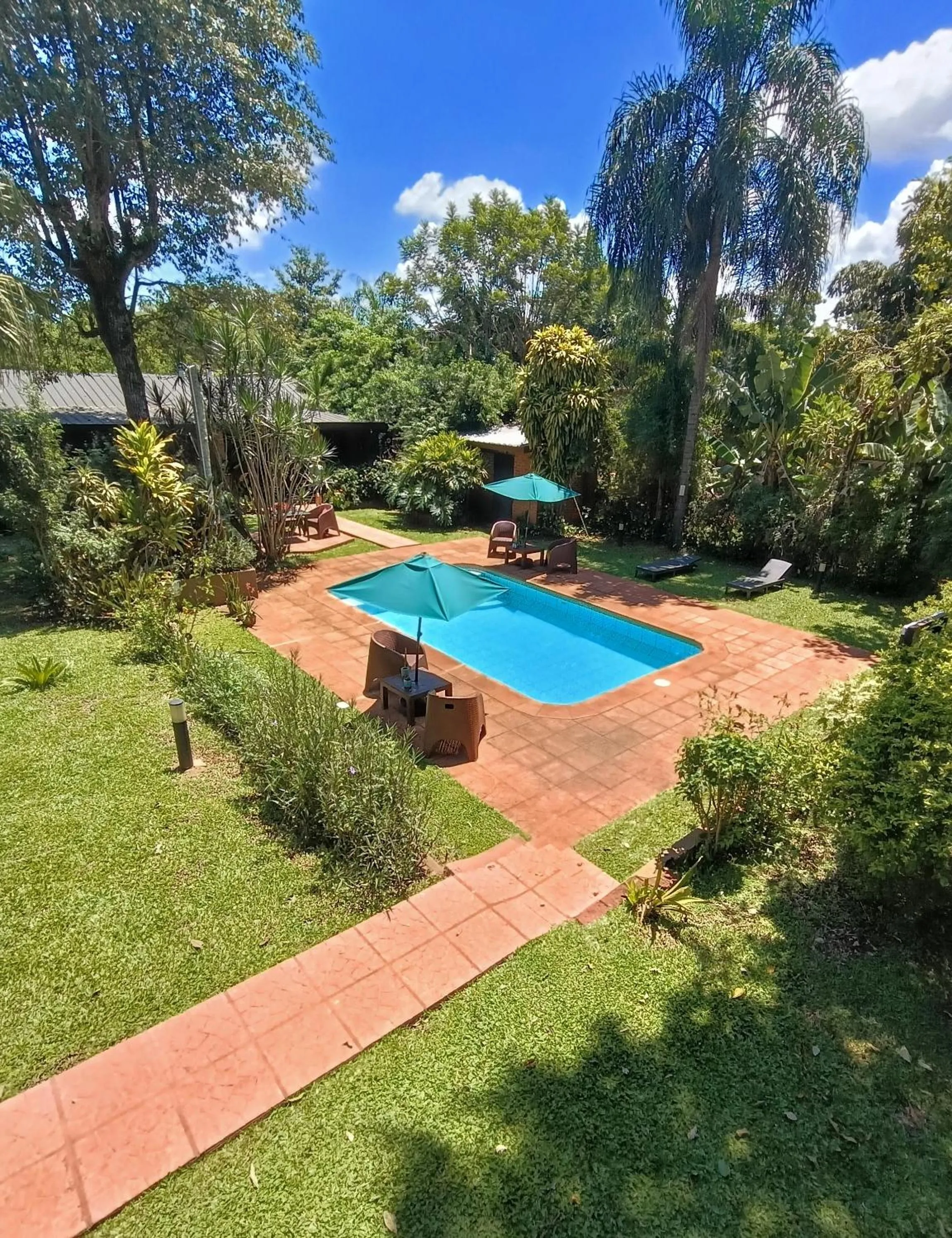 Swimming pool in El Descanso Iguazú by DOT Cabana