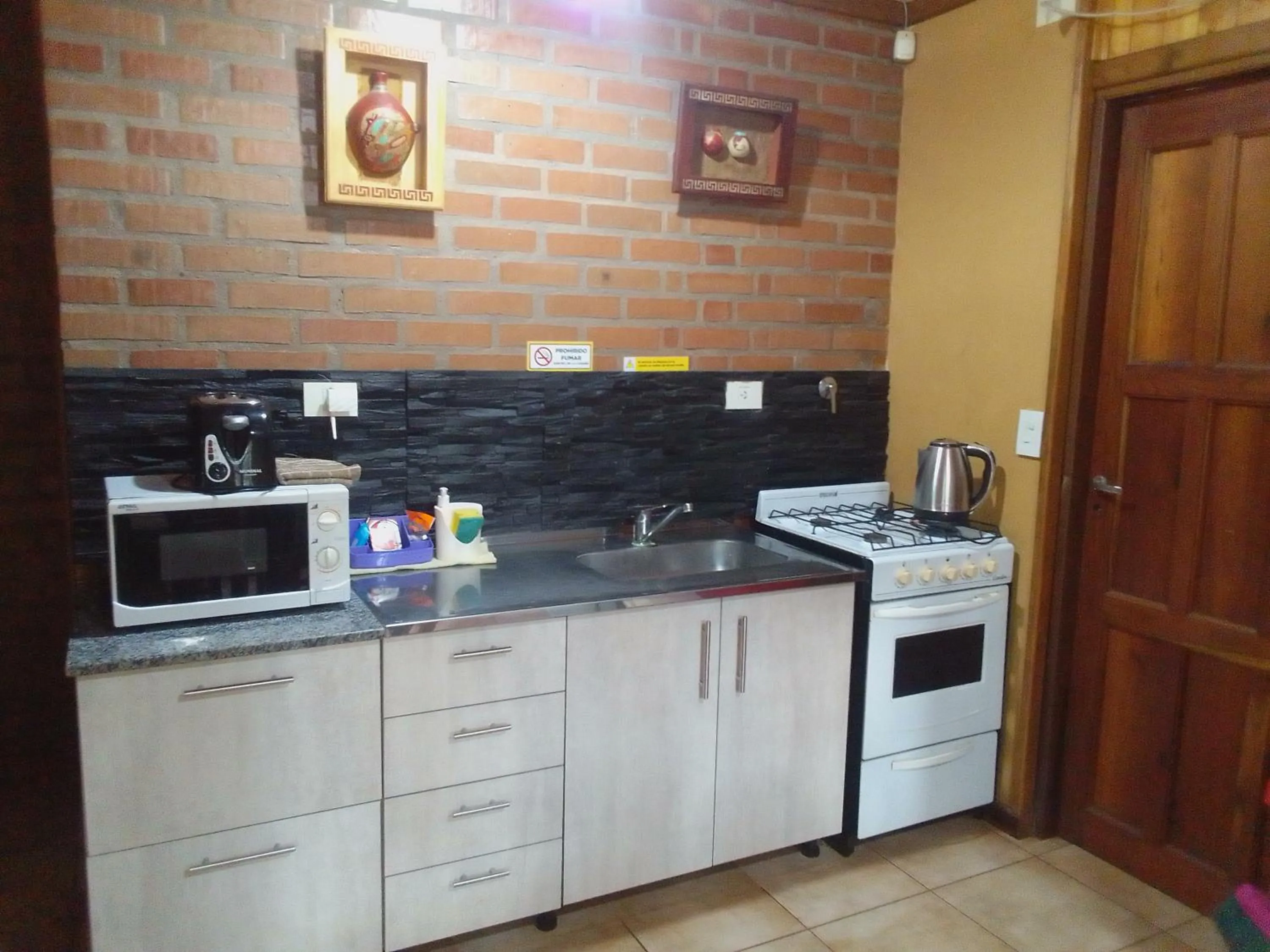 kitchen in El Descanso Iguazú by DOT Cabana