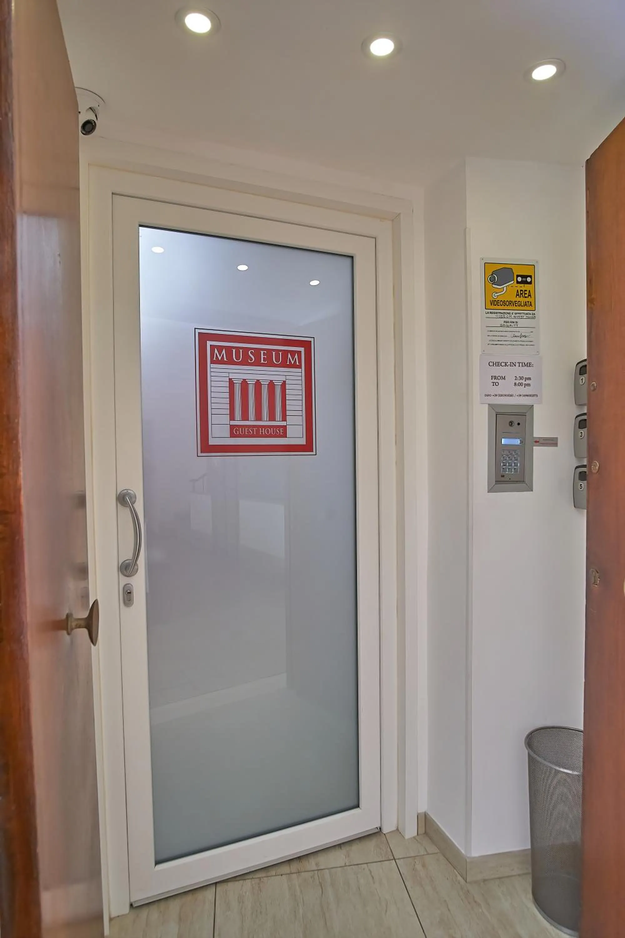 Text overlay in Museum Guest House