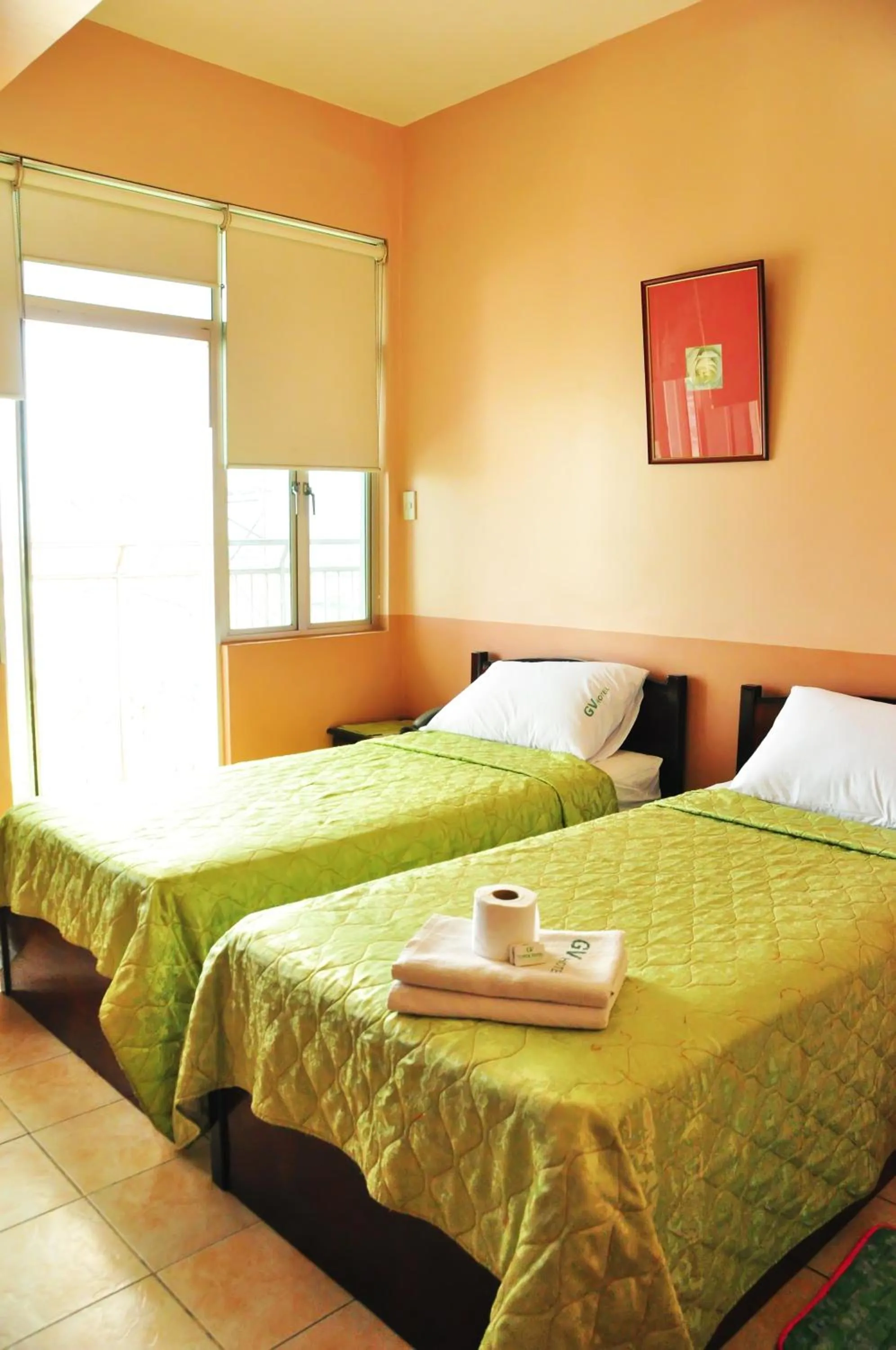 Bed in GV Tower Hotel