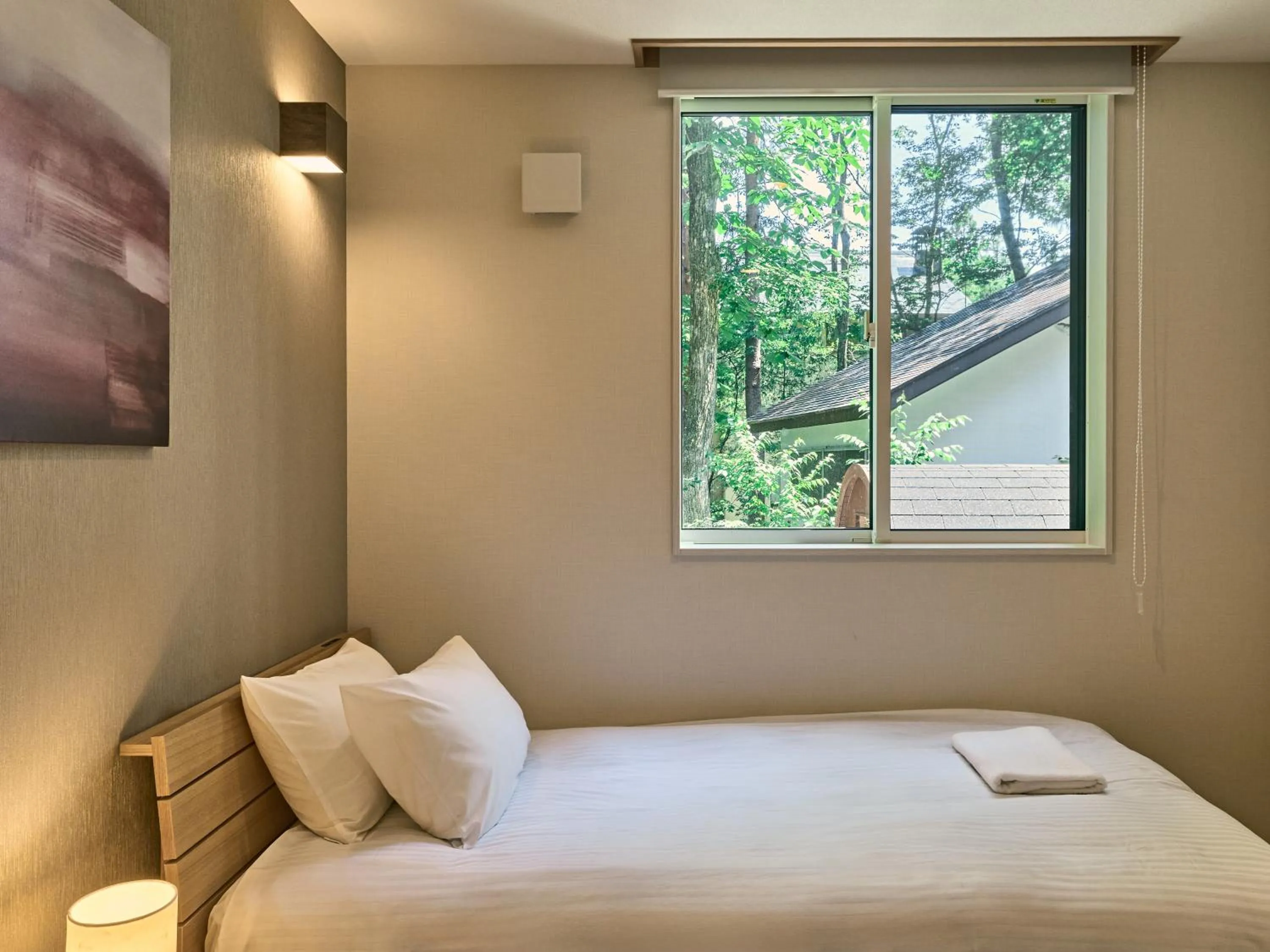 Bed in The Seasons Apartments Hakuba