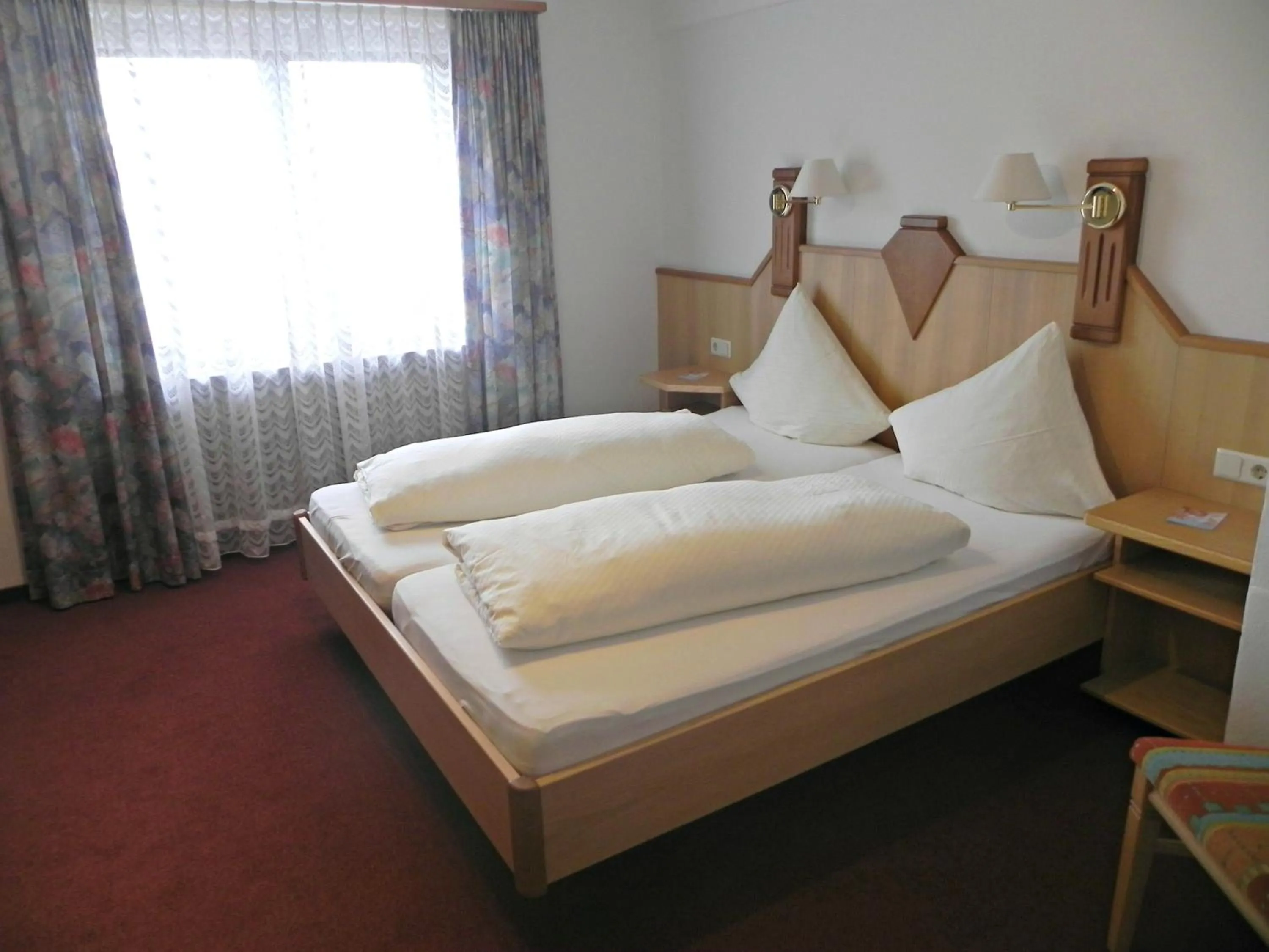 Decorative detail, Bed in Hotel-Restaurant Sonnhof