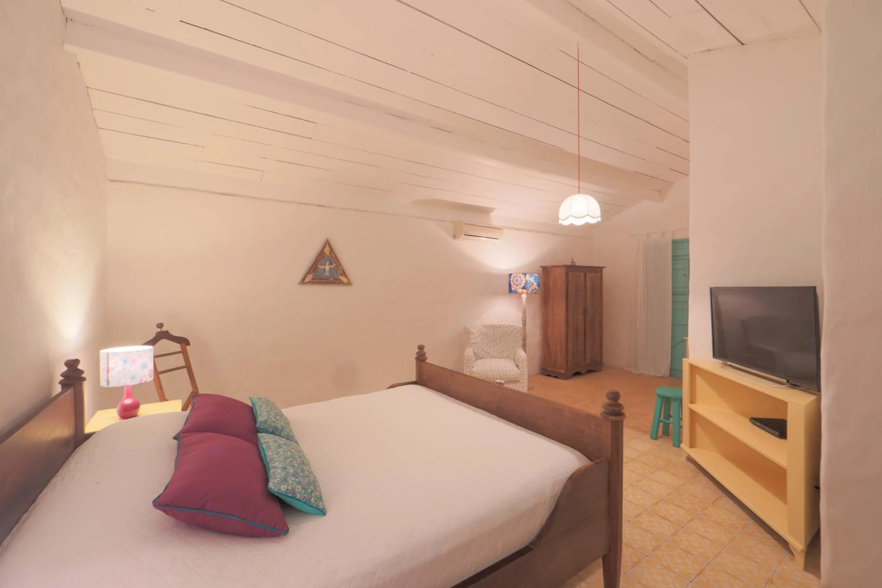 Bed in Pousada Patacho