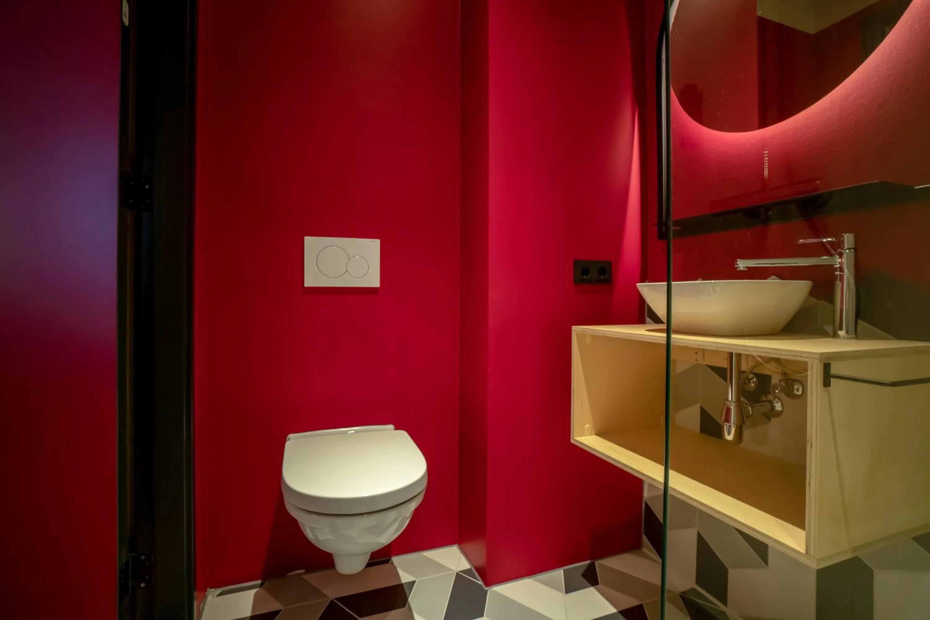 Toilet in Via Suites